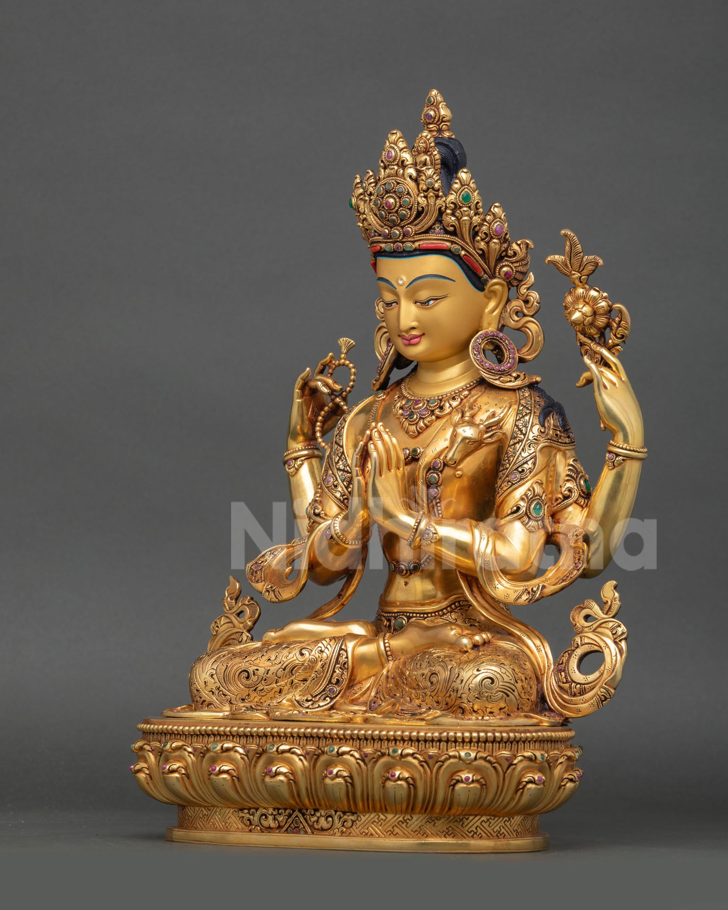 left view chenrezig statue engraved details gold gilded buddhist sculpture himalayan art nepal