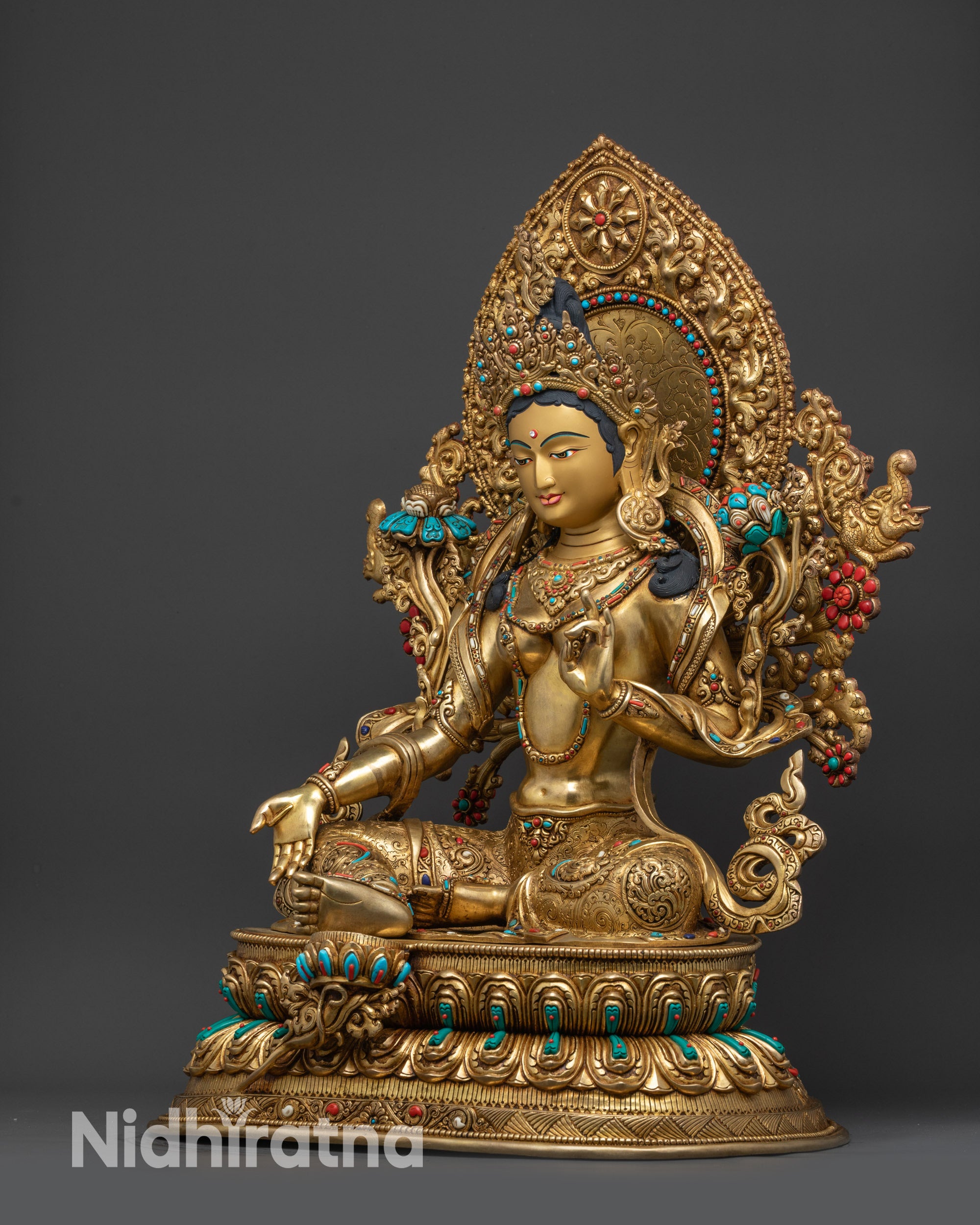 left view side Green Tara sculpture floral halo details, coral stones Tibetan craftsmanship