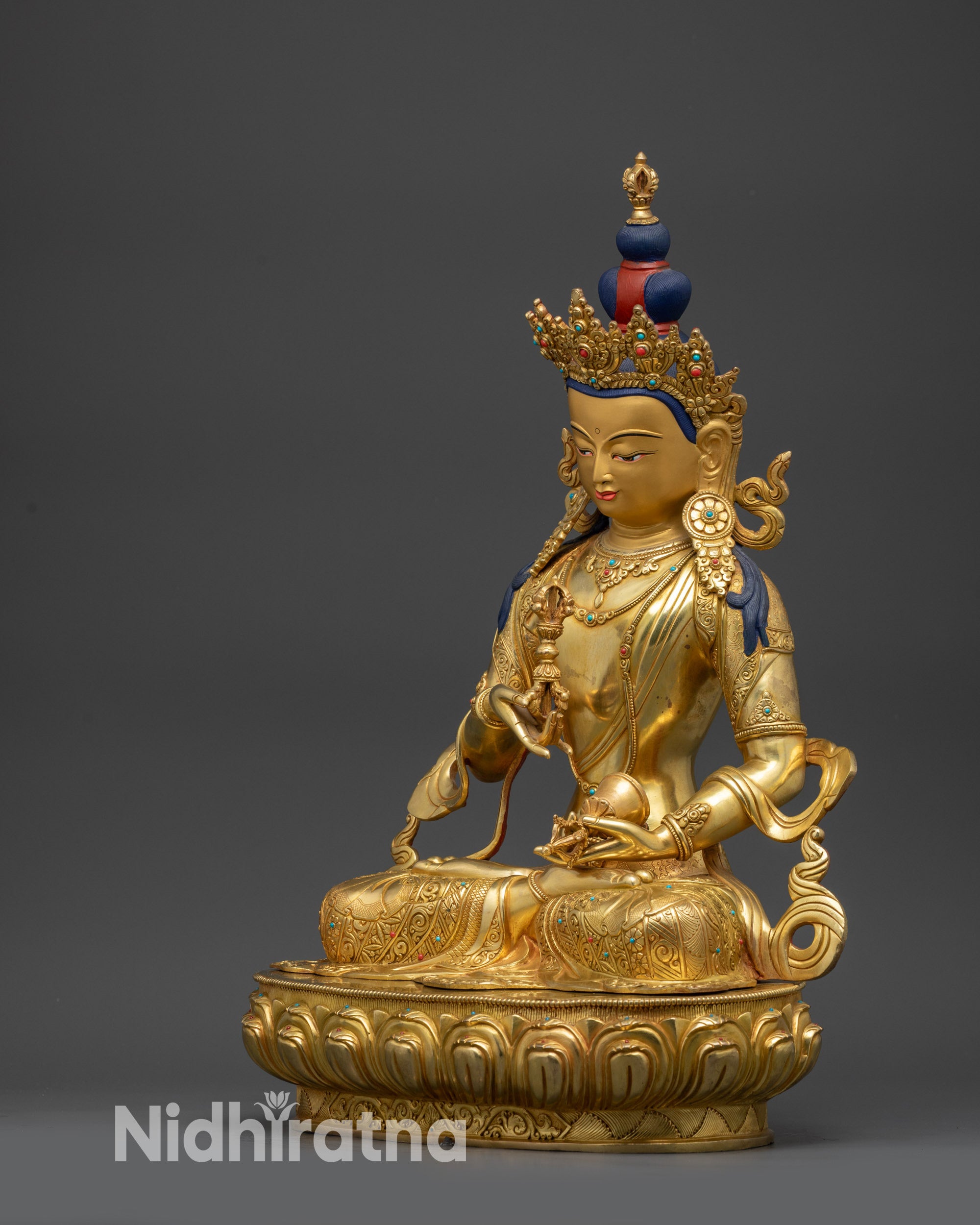 left view side of Vajrasattva Statue displaying intricate semi-precious stone patterns