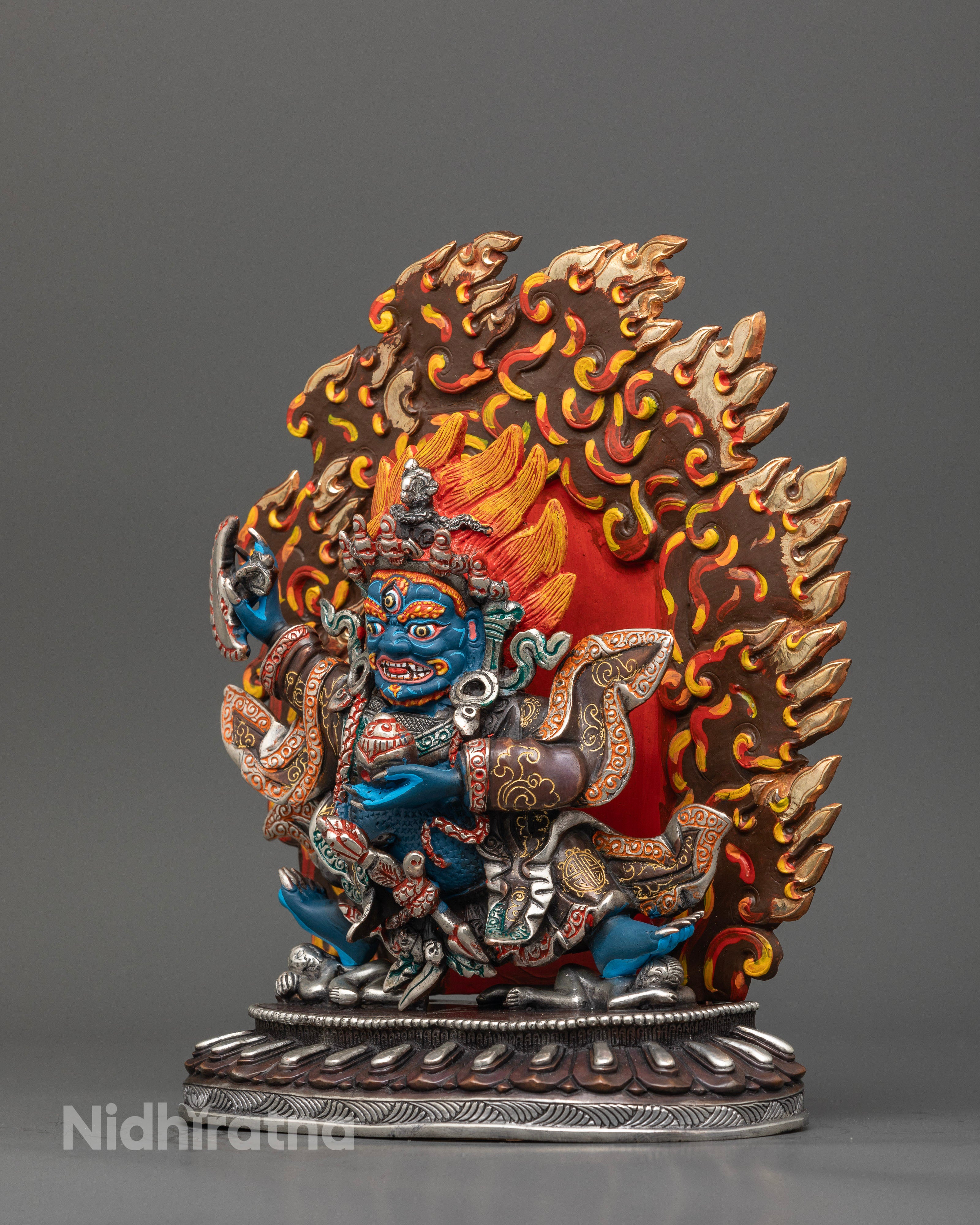 Mahakala bernagchen holding kartika knife and kapala on lotus pedestal.