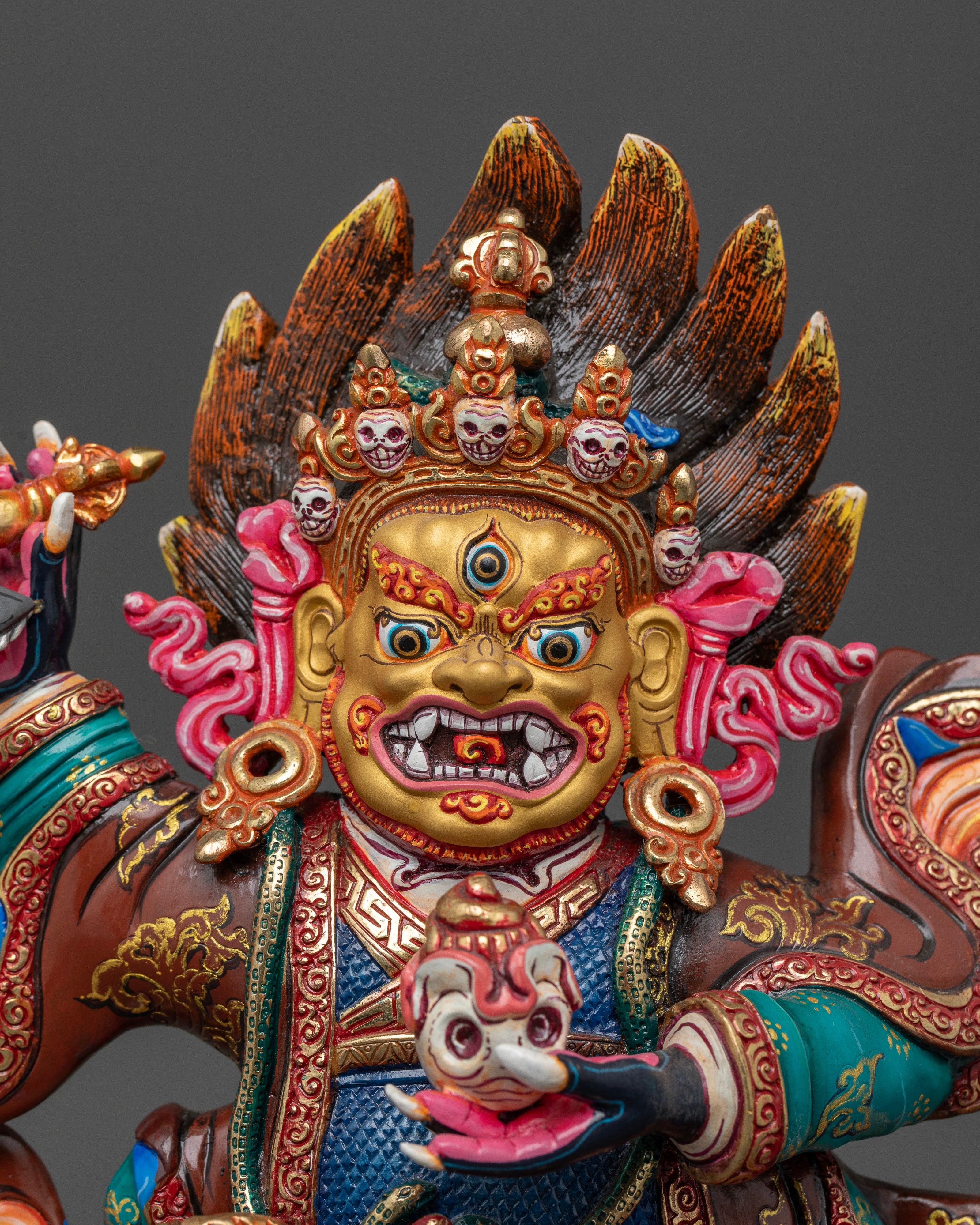 Mahakala Bernagchen statue with 24K gold painted face and acrylic finish.