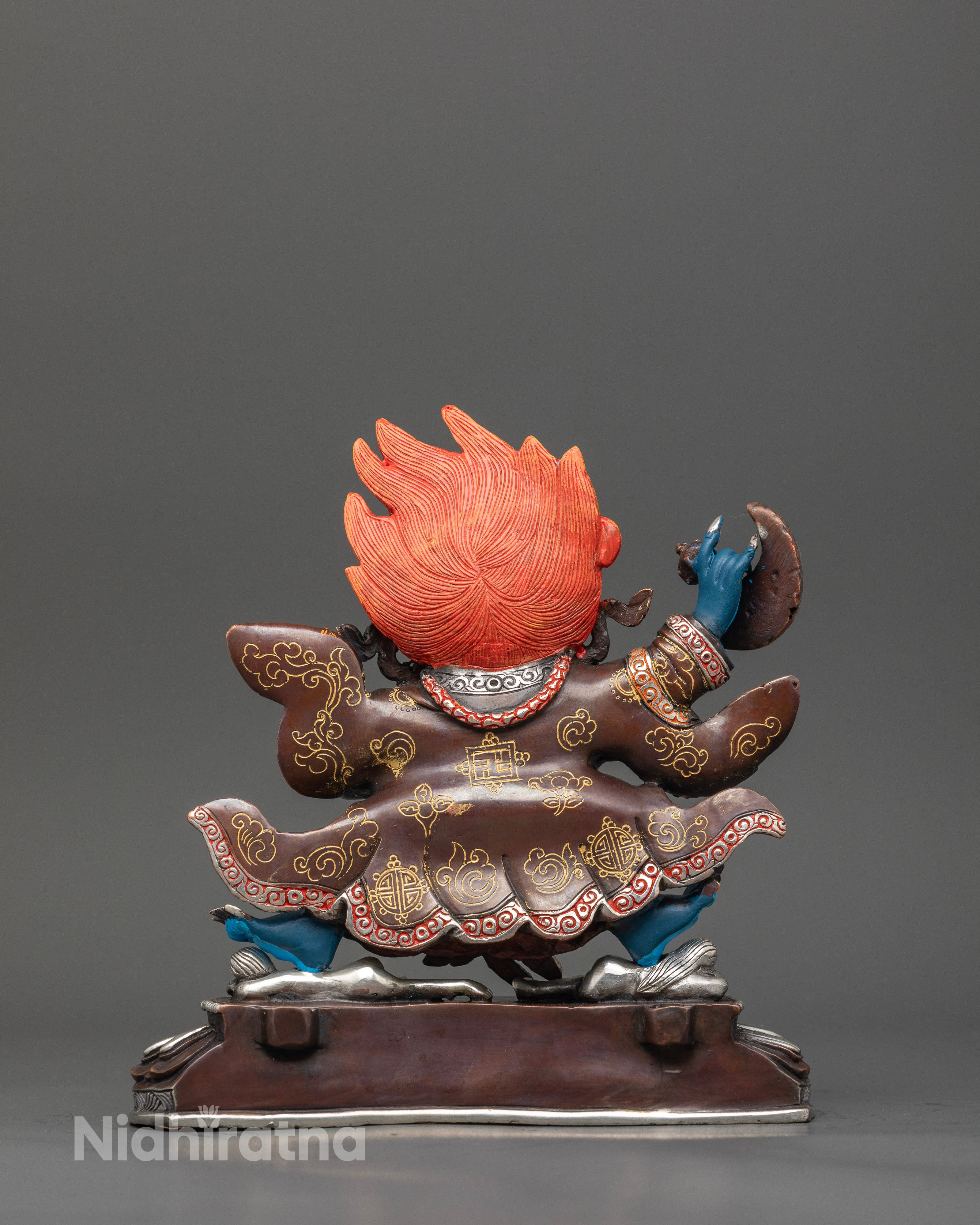 Mahakala bernagchen statue with acrylic painting and silver plated details.