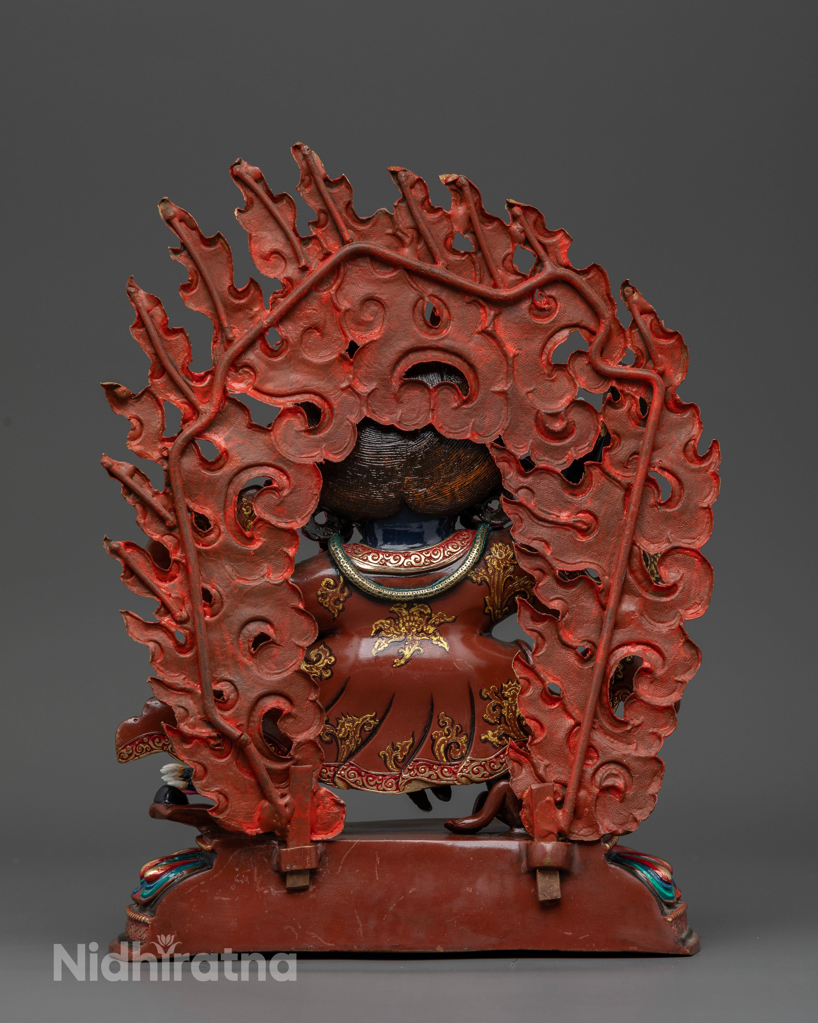 Mahakala Bernagchen holding kartika knife and kapala with flaming halo.