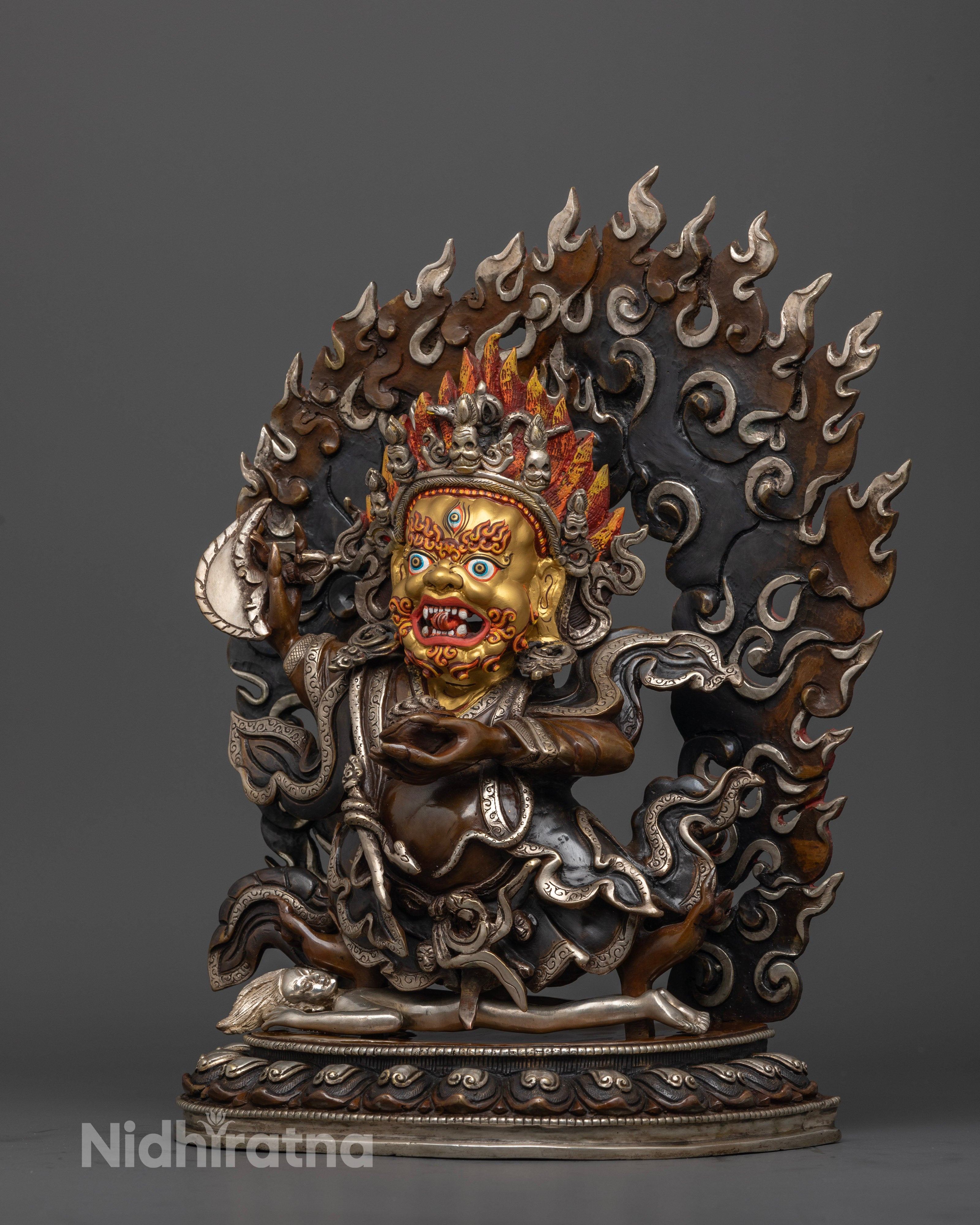 side view of oxidized mahakala bernagchen statue with gold face