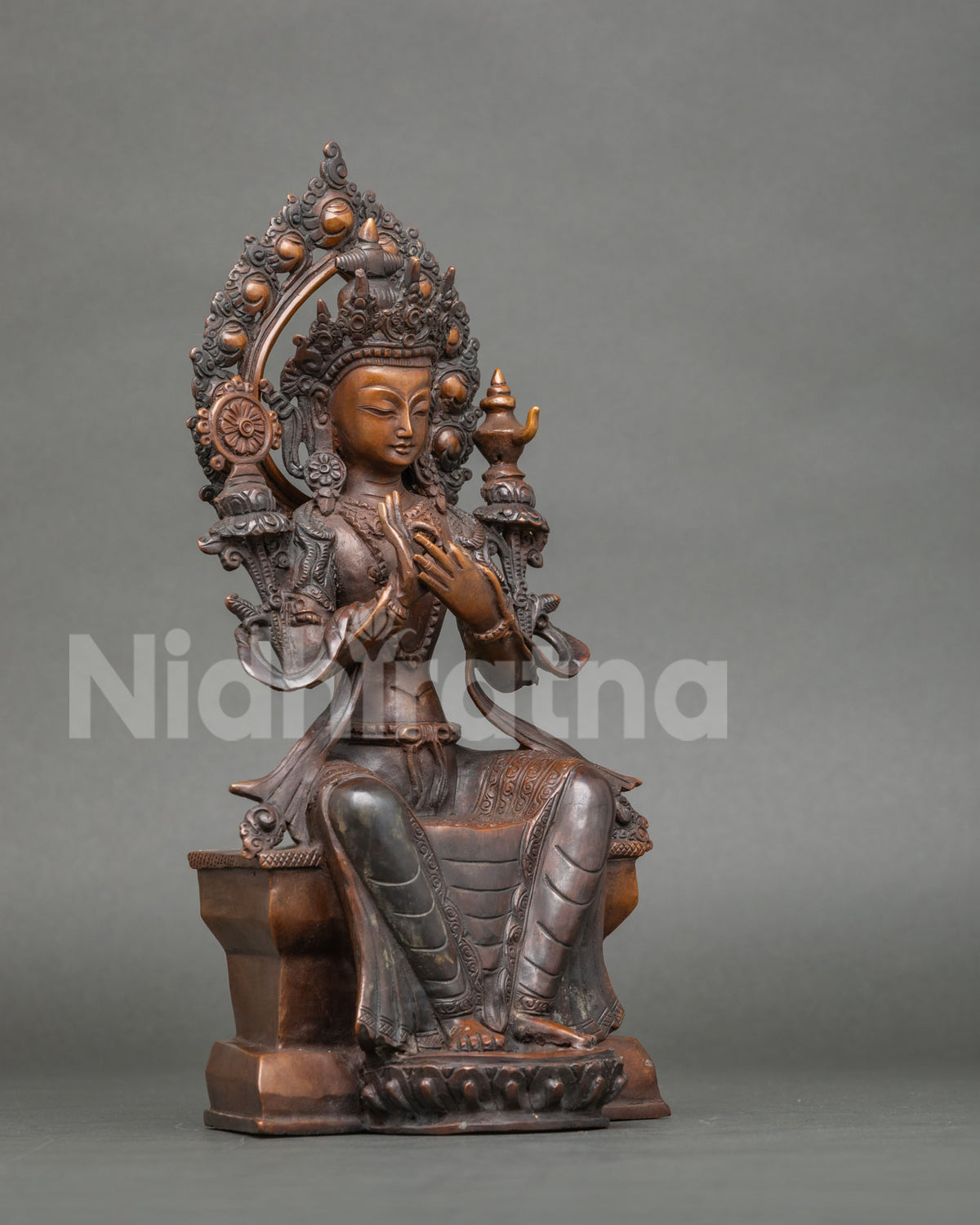 Maitreya Buddha Statue seated on an ornate throne with a lotus pedestal.