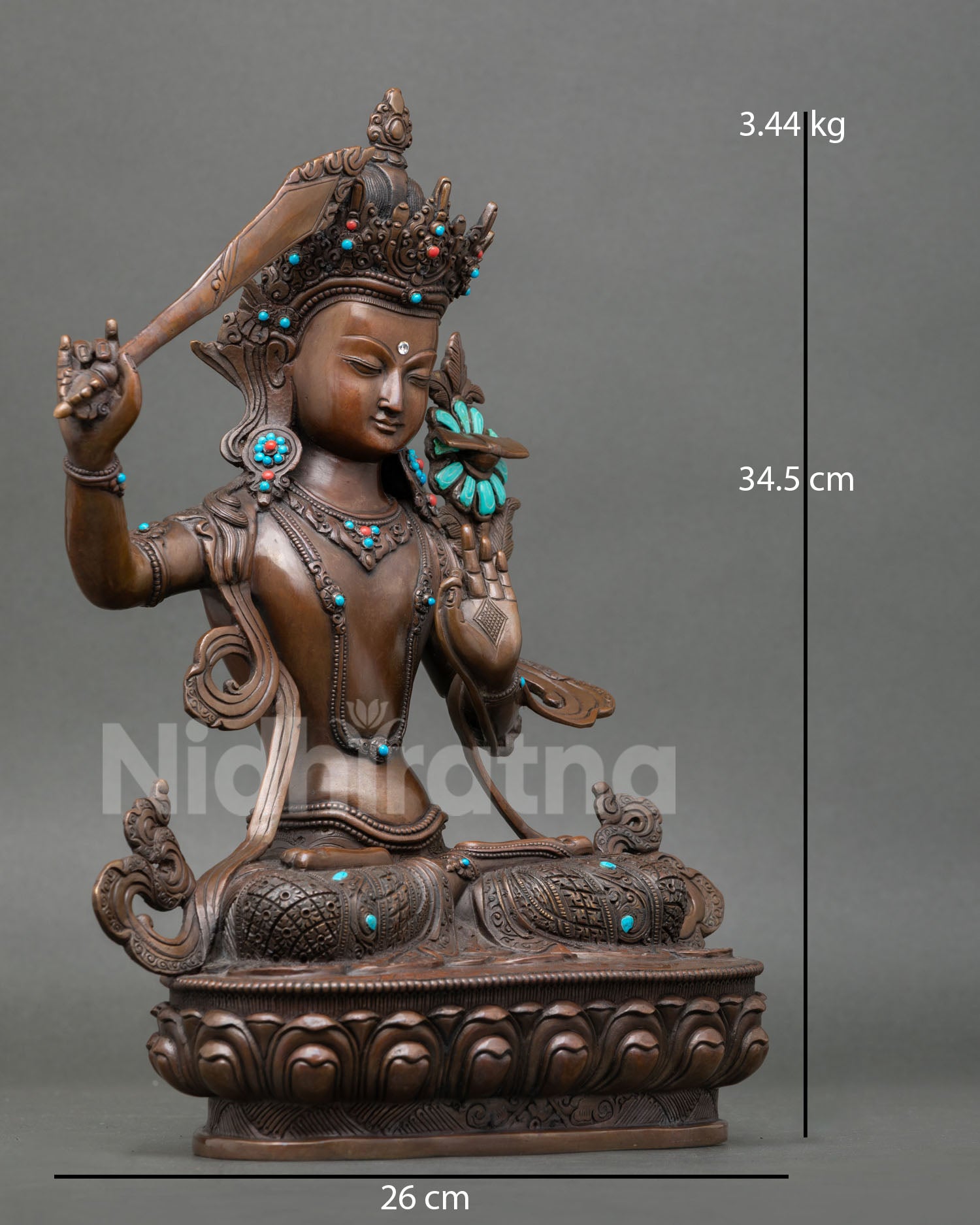 Manjushree statue with blooming lotus supporting Prajnaparamita Sutra, oxidized copper Buddhist deity sculpture from Patan Nepal