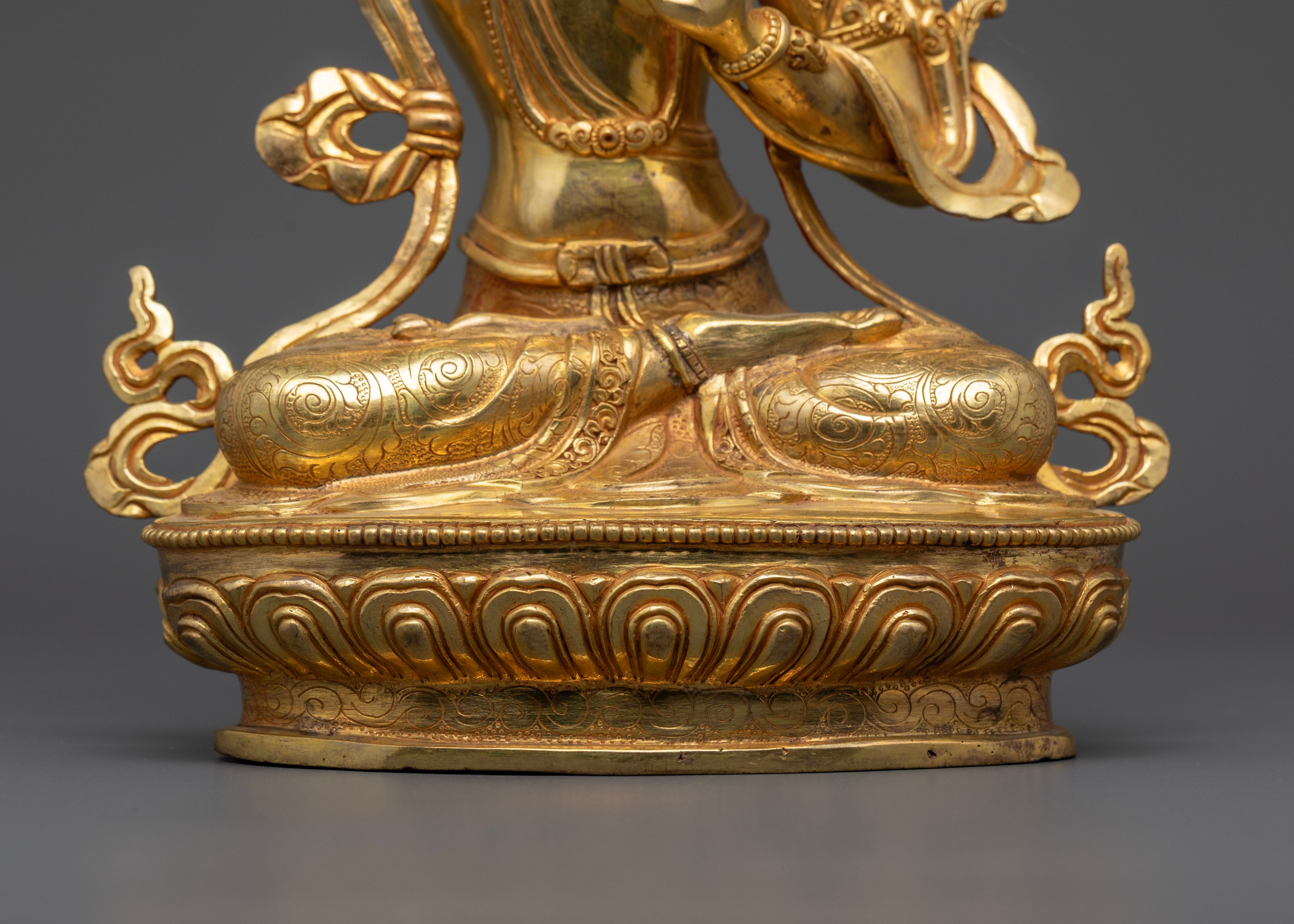 The crossed leg of gold plated Manjushree statue | Manjushree deity statue for mindfulness | Manjushree Bodhisattva statue