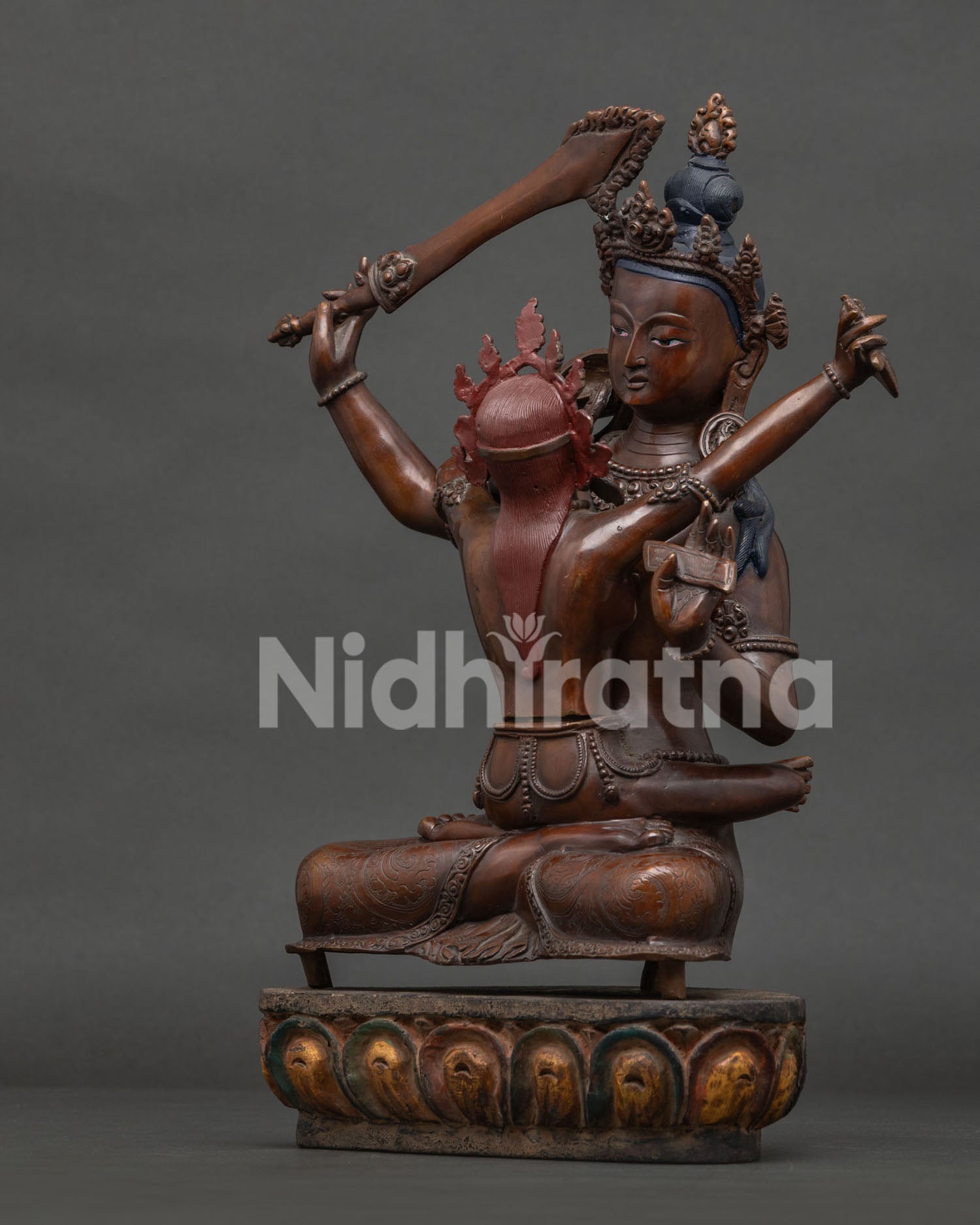 Manjushri consort holding kartika knife and skull cup in sacred union.