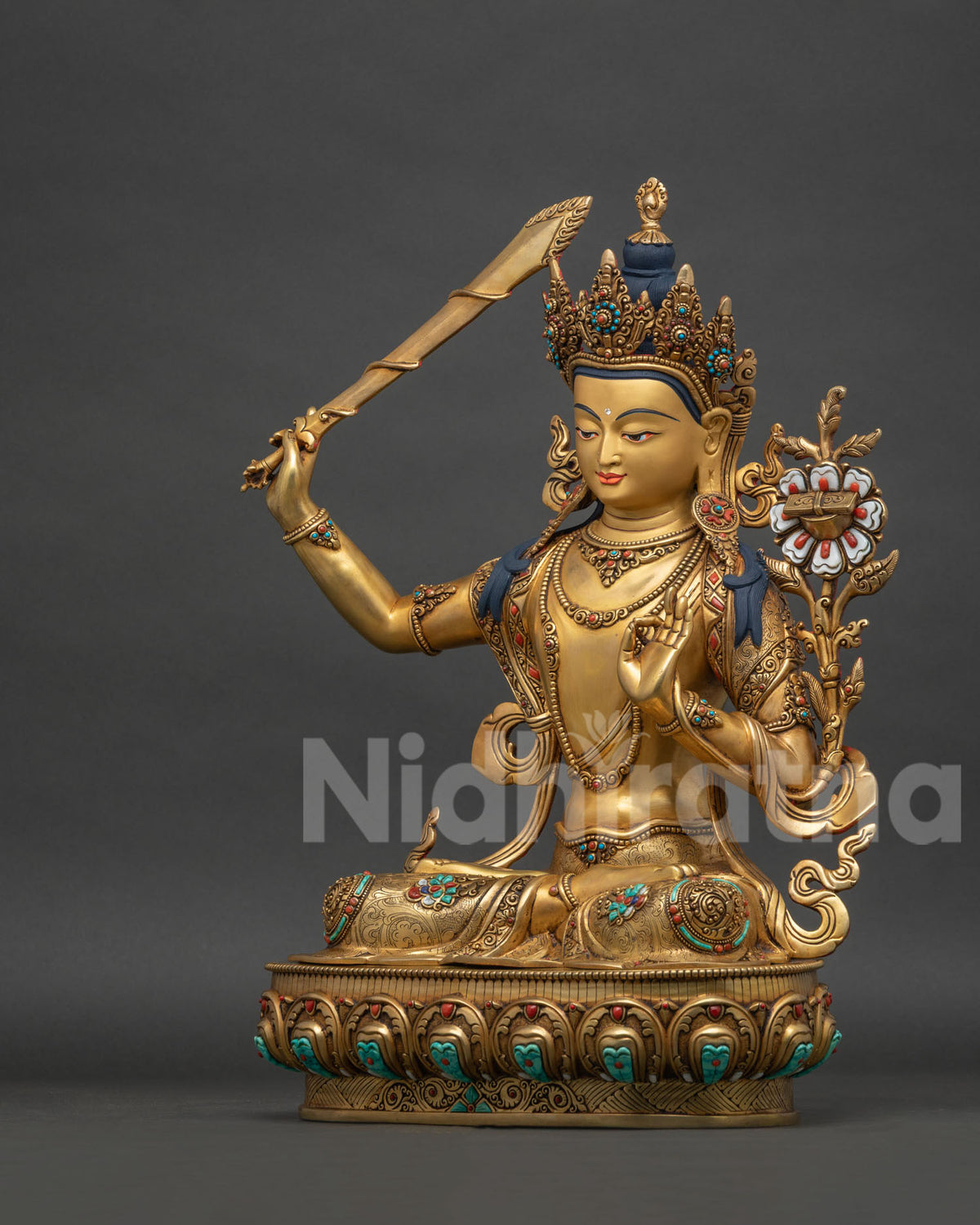 Manjushri Copper Statue left side view, Himalayan Buddhist wisdom sculpture