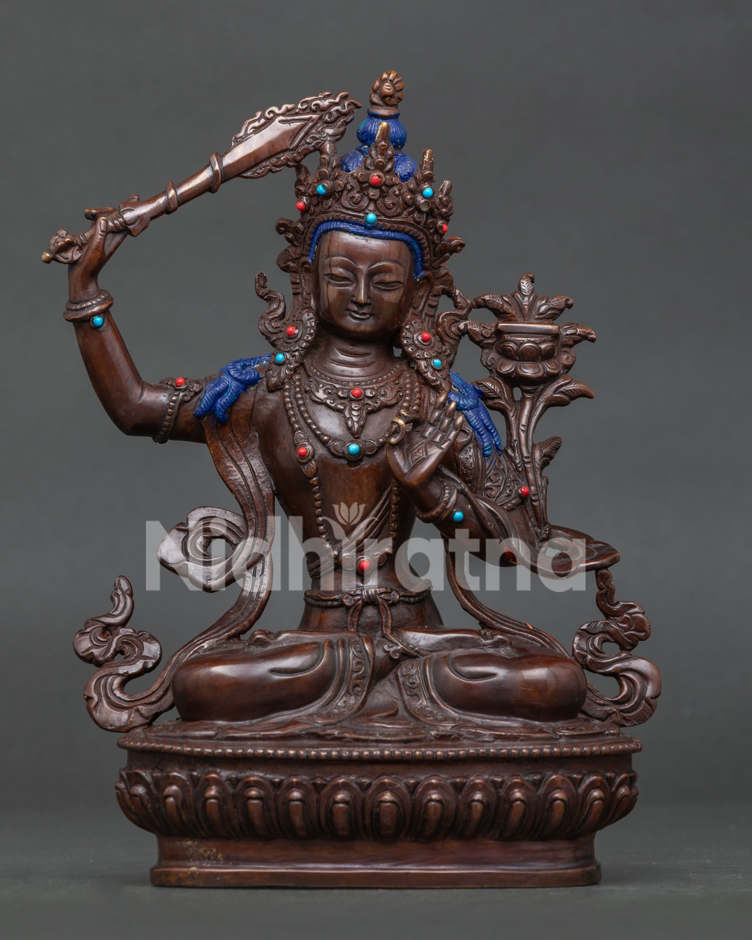 Manjushri statue, handcrafted by Newari artisans in Patan, Nepal with oxidized copper finish