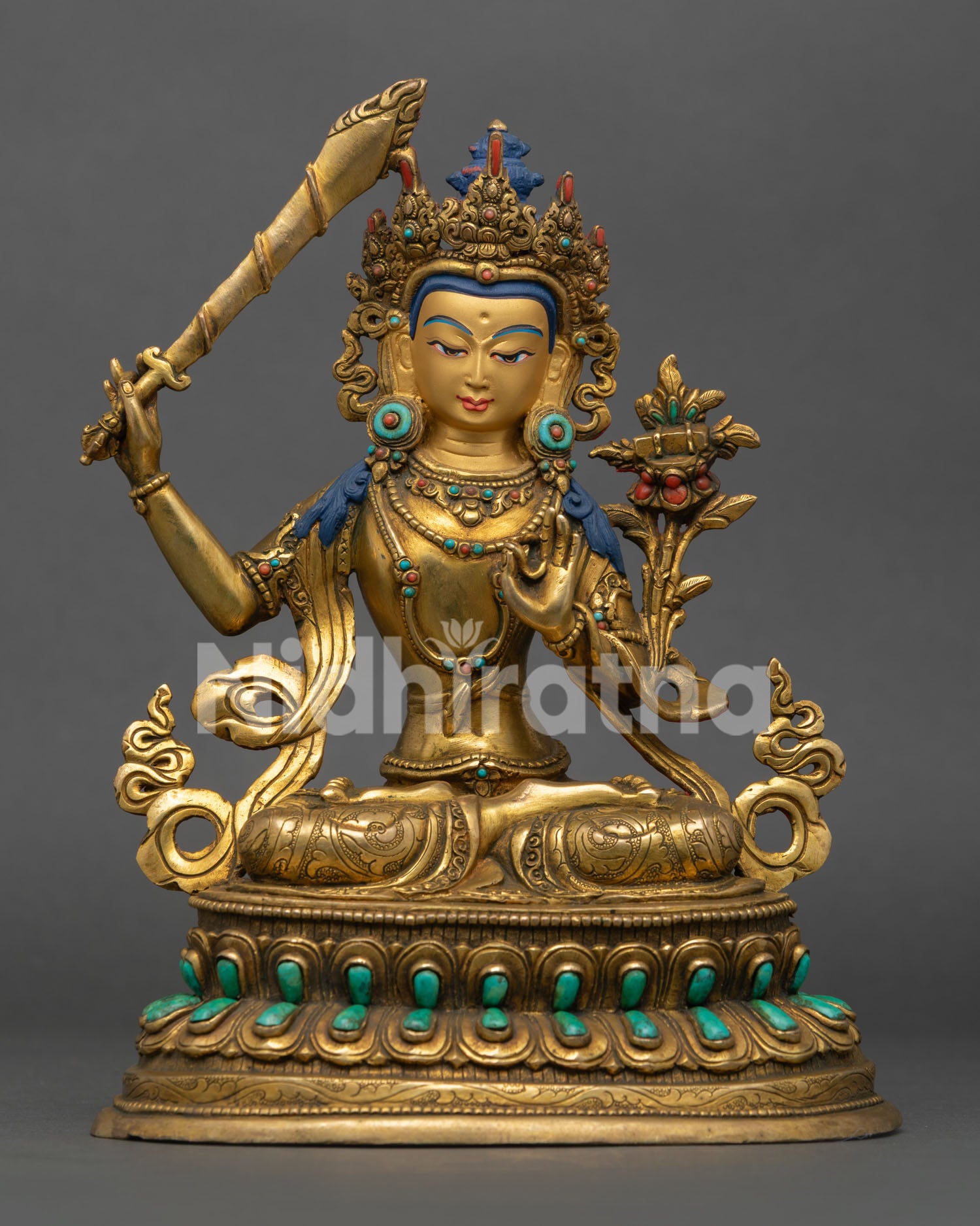 manjushri statue handcrafted in nepal with gold gilding and turquoise stone inlays