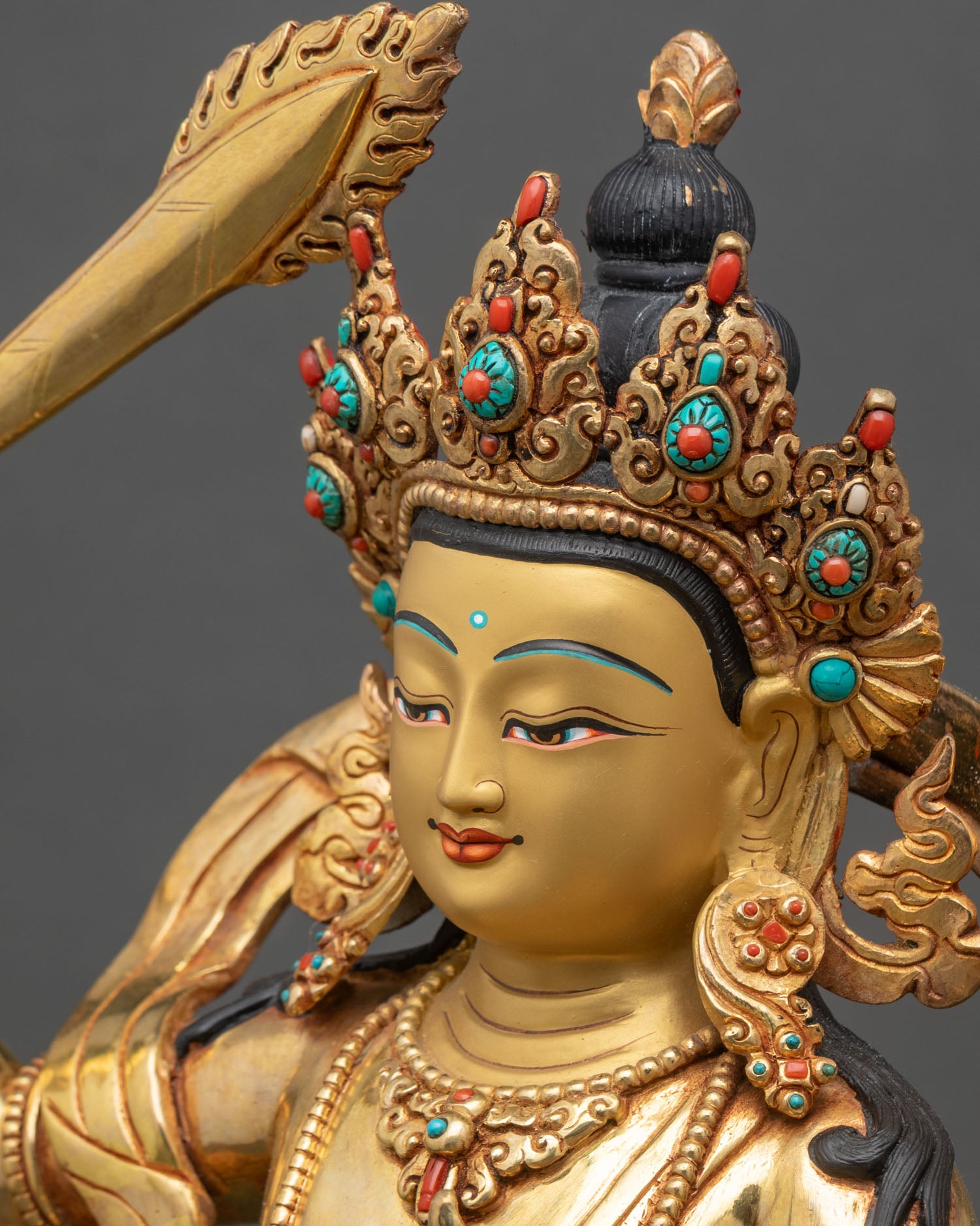 Manjushri Statue Side Face Close-Up, Gold Features, Wisdom Deity