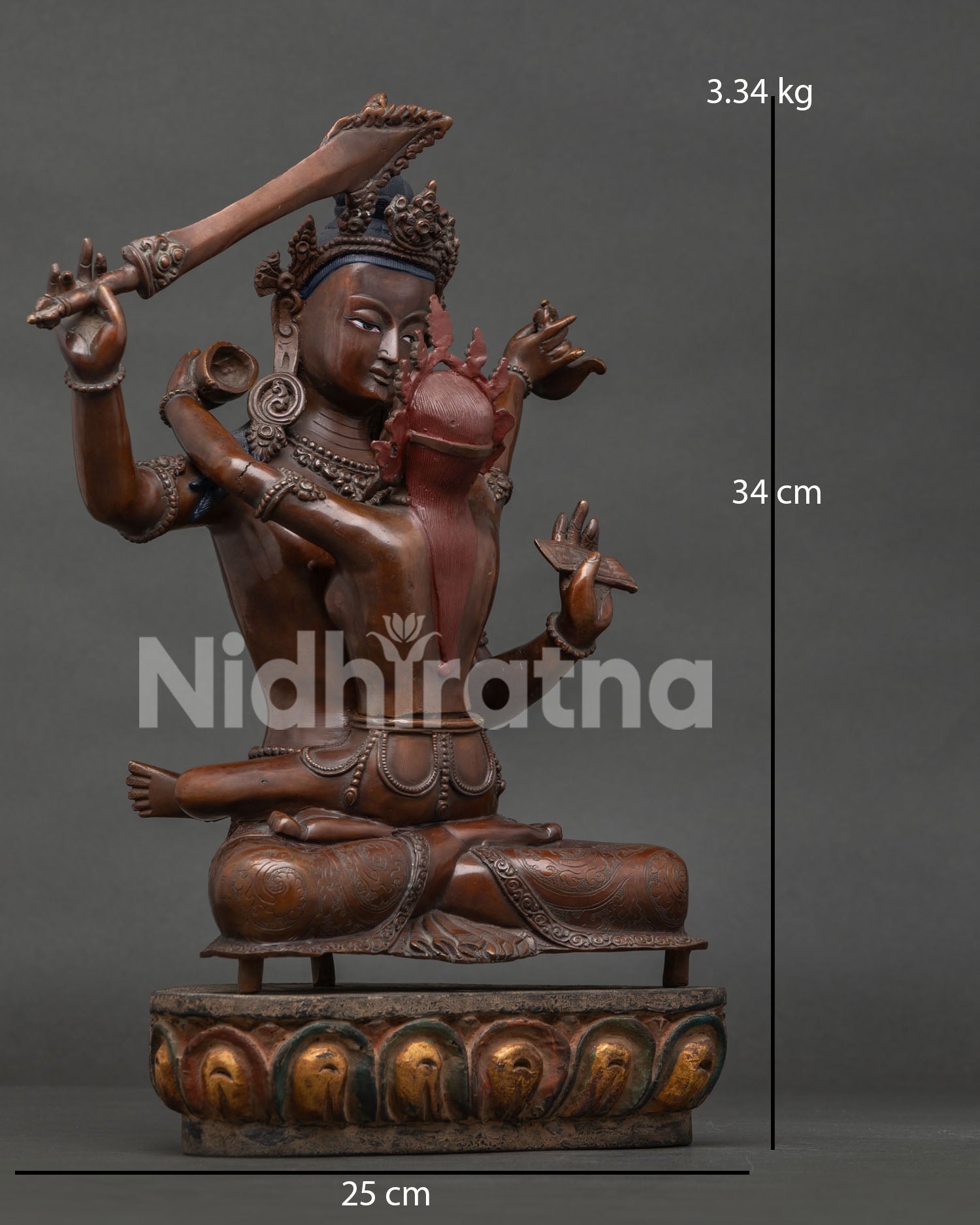 Manjushri with consort seated on lotus pedestal in Yab Yum posture.
