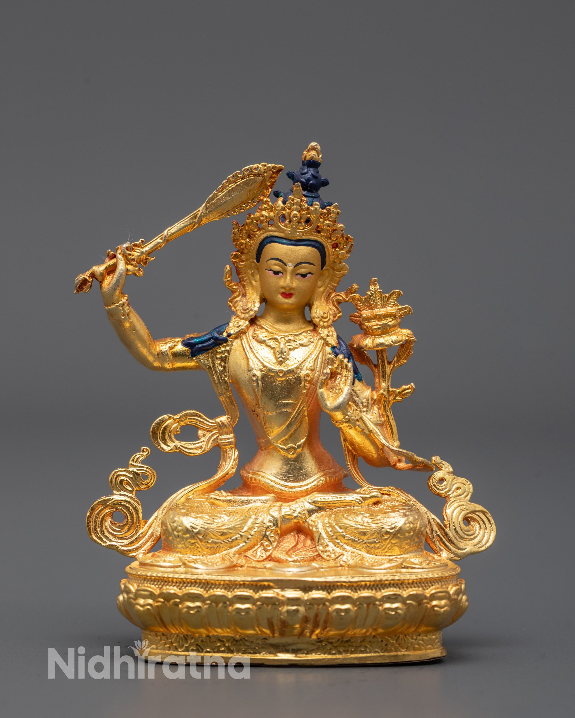 manjusri statue front view with flaming sword and five-jeweled crown, gold-plated finish