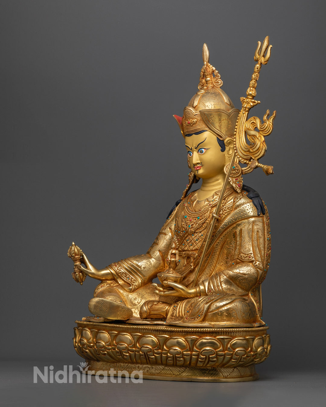 masterfully handcrafted Guru Rinpoche statue highlighting ornate crown and symbolic jewelry with fine detailing.