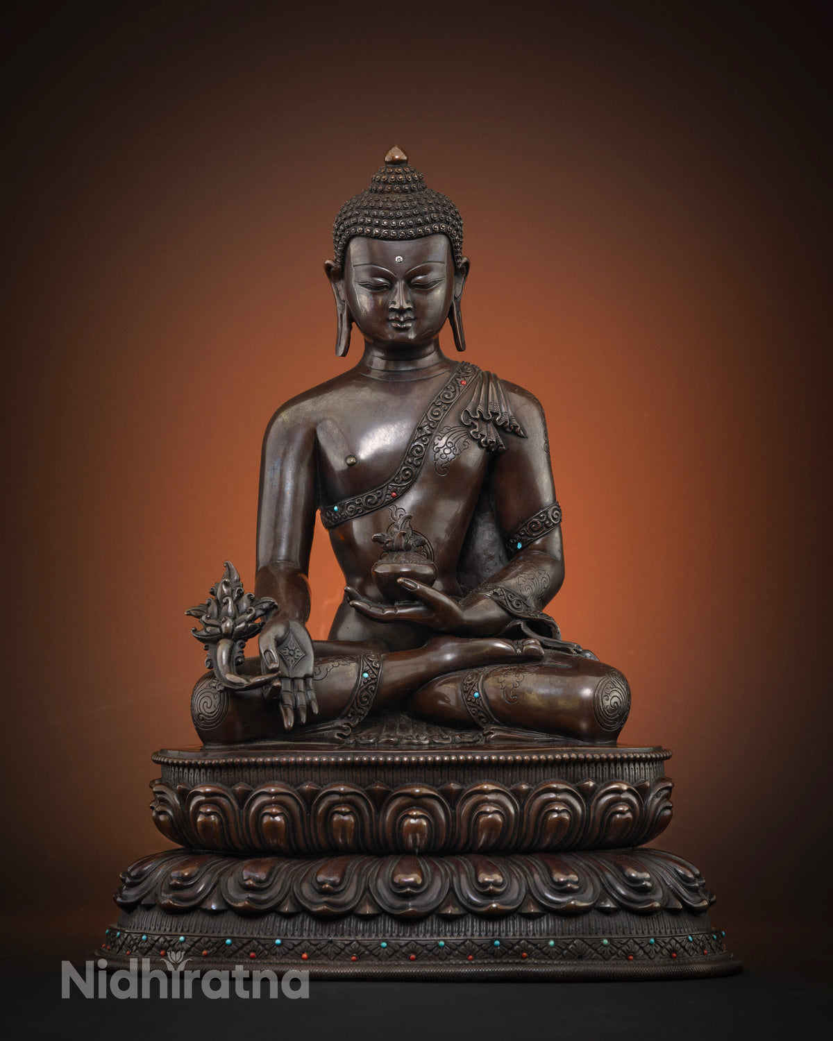 Medicine Buddha statue front view, handcrafted oxidized copper Bhaisajyaguru sculpture from Nepal