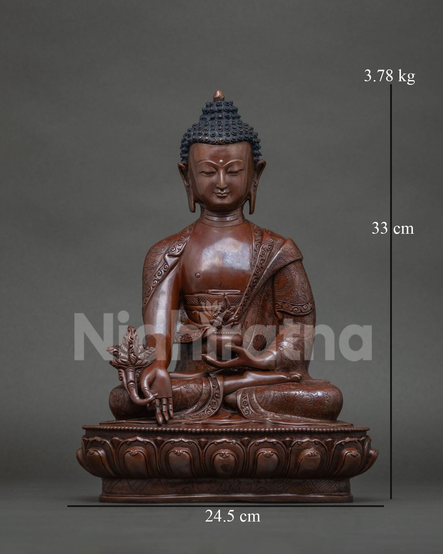 Medicine Buddha statue front view in oxidized copper by Newari artisans.