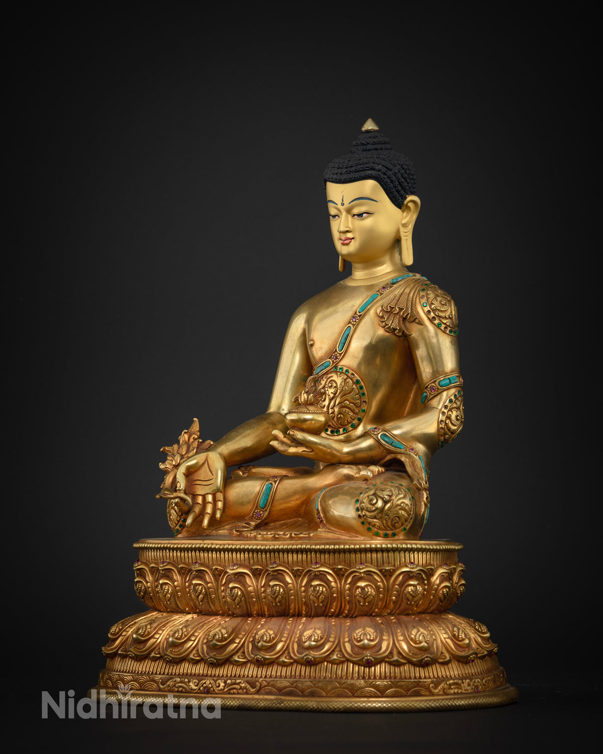 Medicine Buddha statue left side view, healing bowl and myrobalan plant in hand
