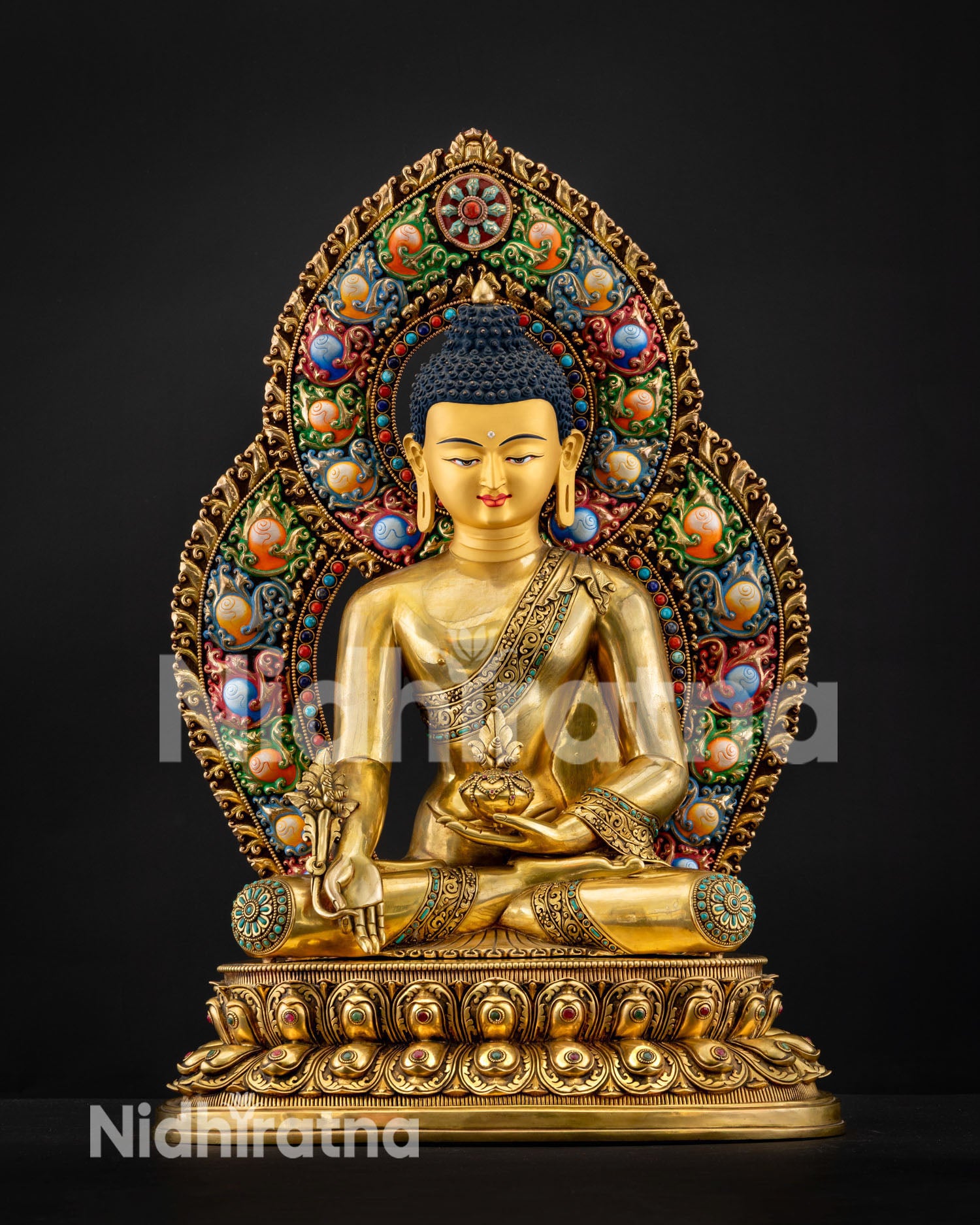 Medicine Buddha statue with gemstone prabhavali, holding healing bowl and myrobalan on lotus pedestal