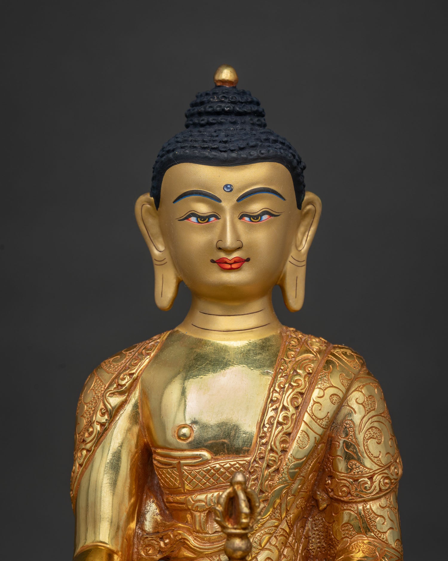 Mitrugpa Statue with 24K Gold Painted Face and Hand-Carved Floral Silk Garment.