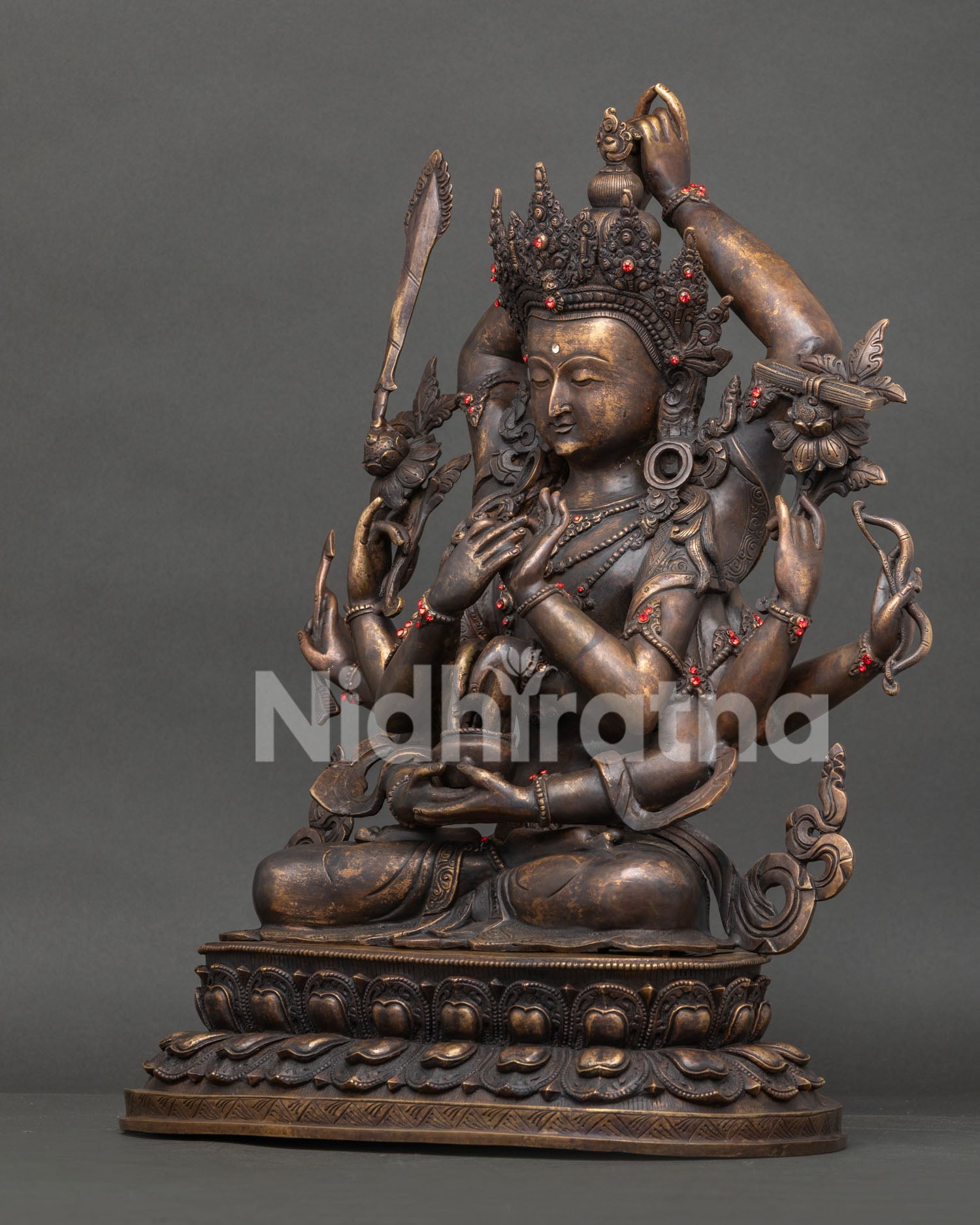 Namasangiti deity statue from Nepal featuring ten arms meditative focus and spiritual symbolism