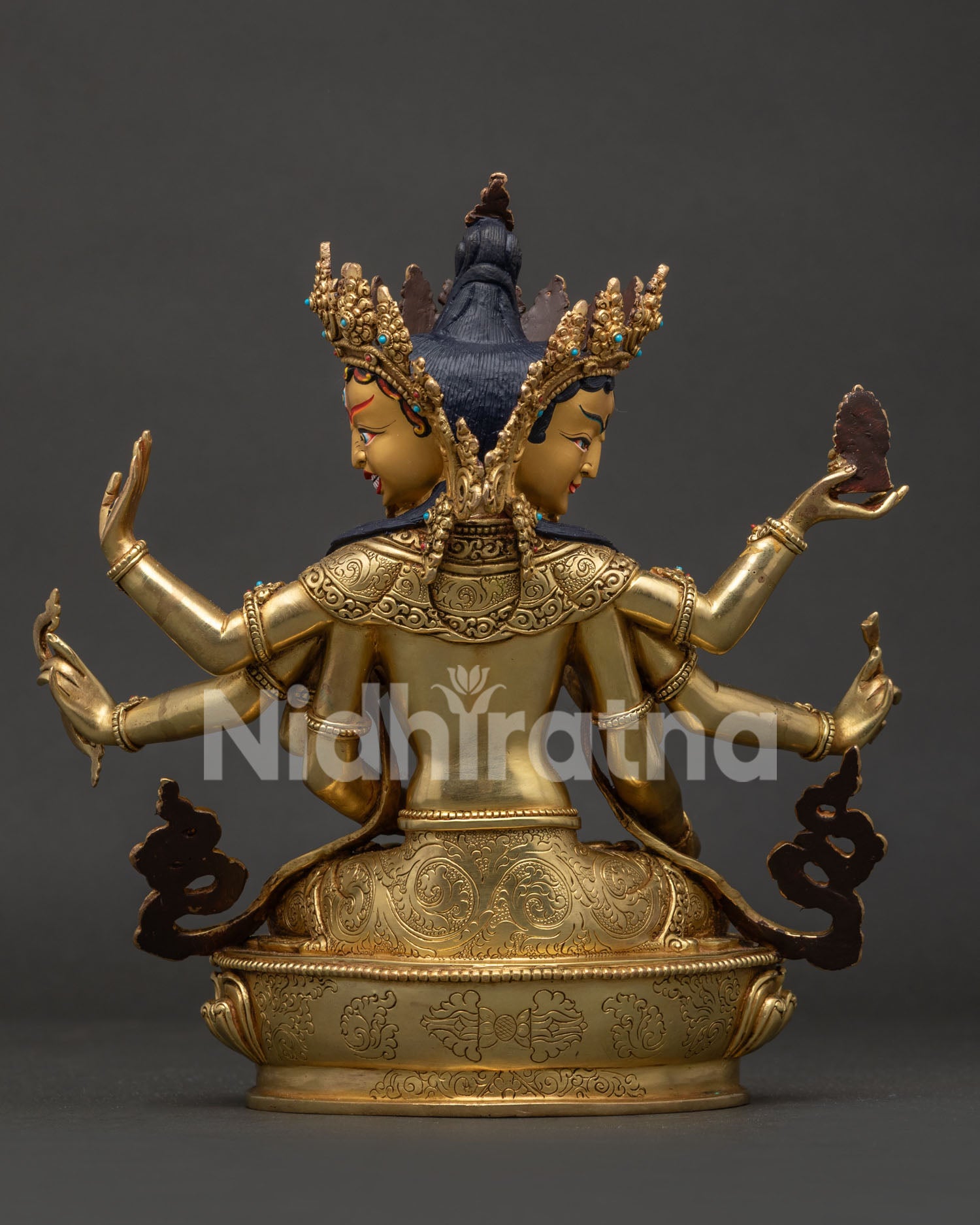 Namgyalma Buddhist statue back view showing copper craftsmanship and traditional Himalayan lost wax casting details.