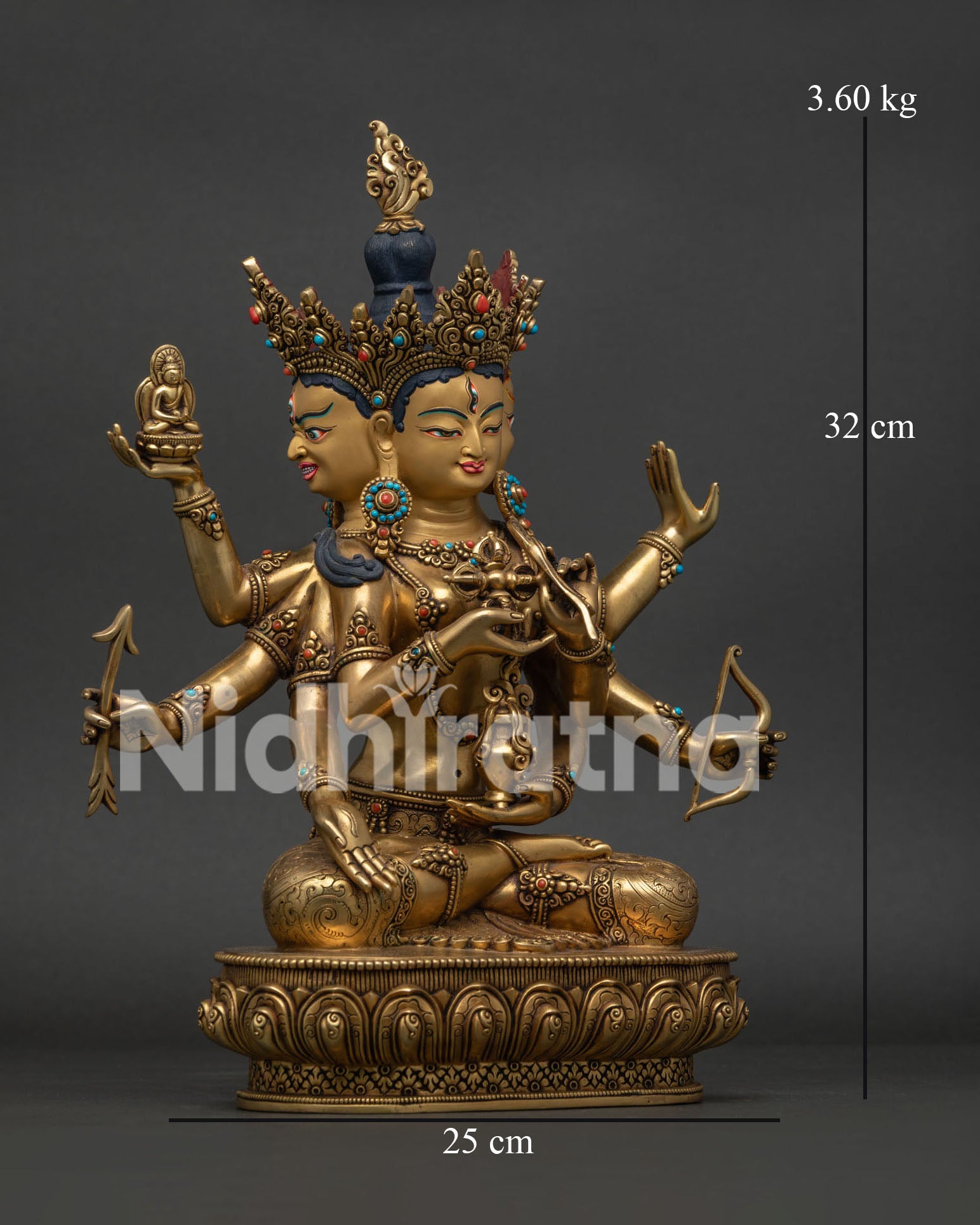 Namgyalma statue, holding dorje, vase bow, arrow and sacred symbols