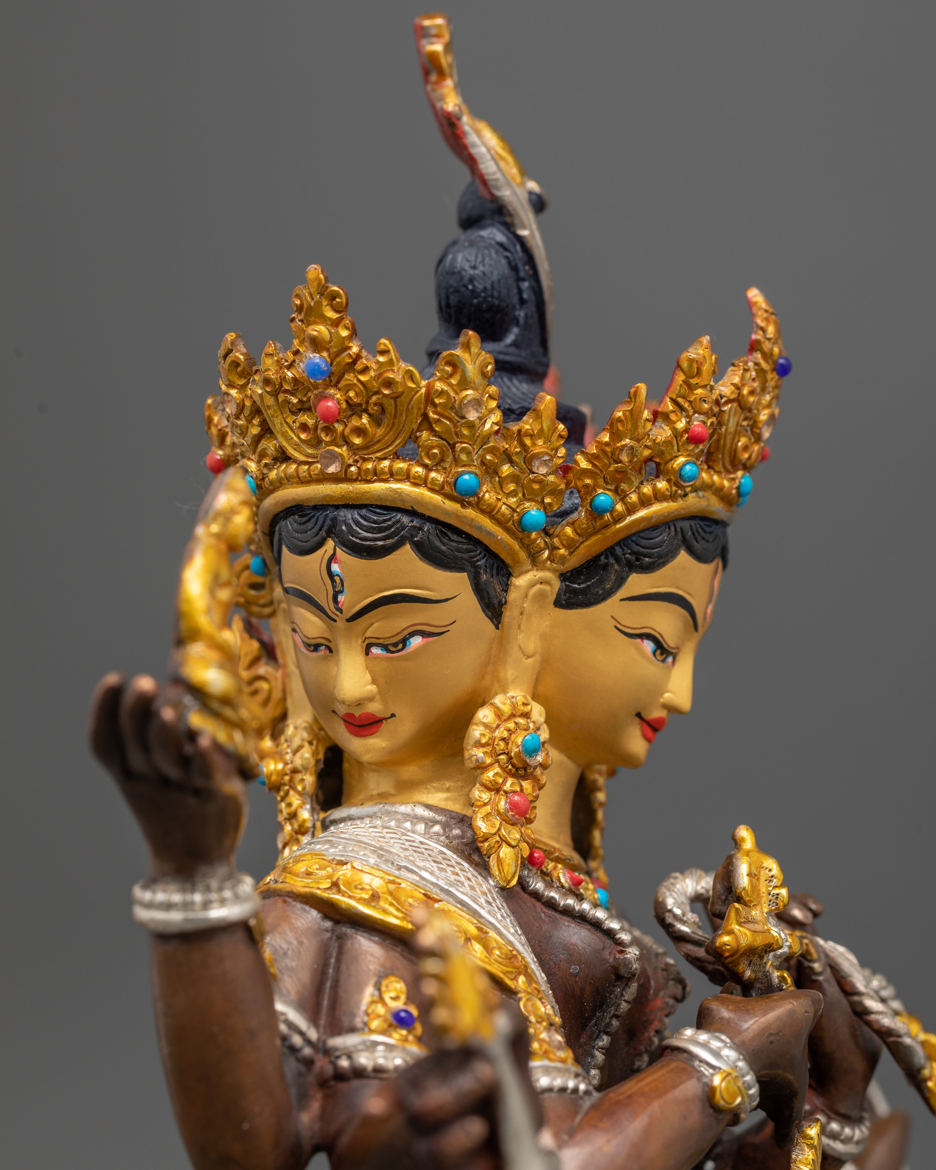 pure golden face of namgyalma statue side face