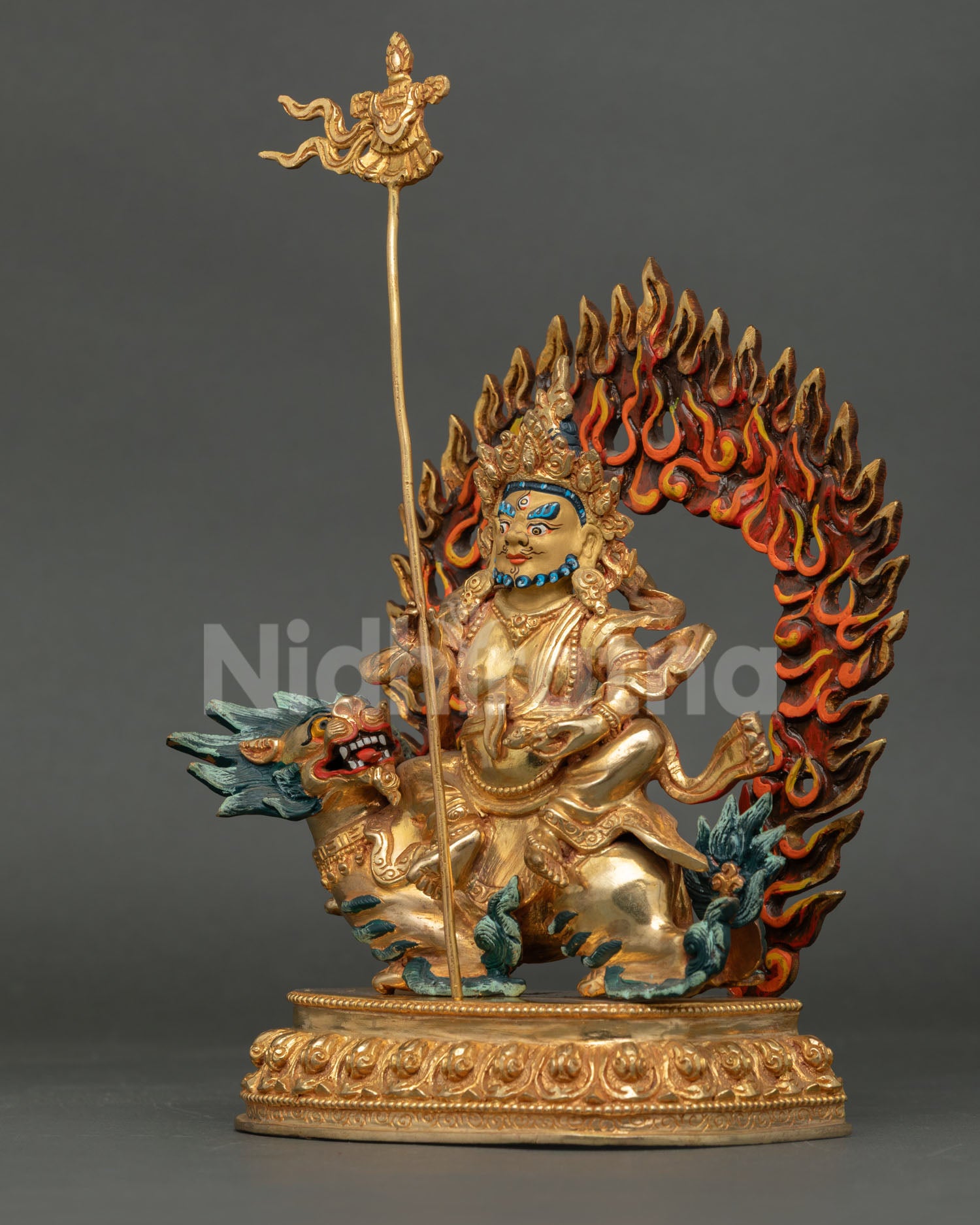 Namtoshe Statue holding Gyaltsen victory banner and jewel spitting mongoose seated on snow lion lotus seat