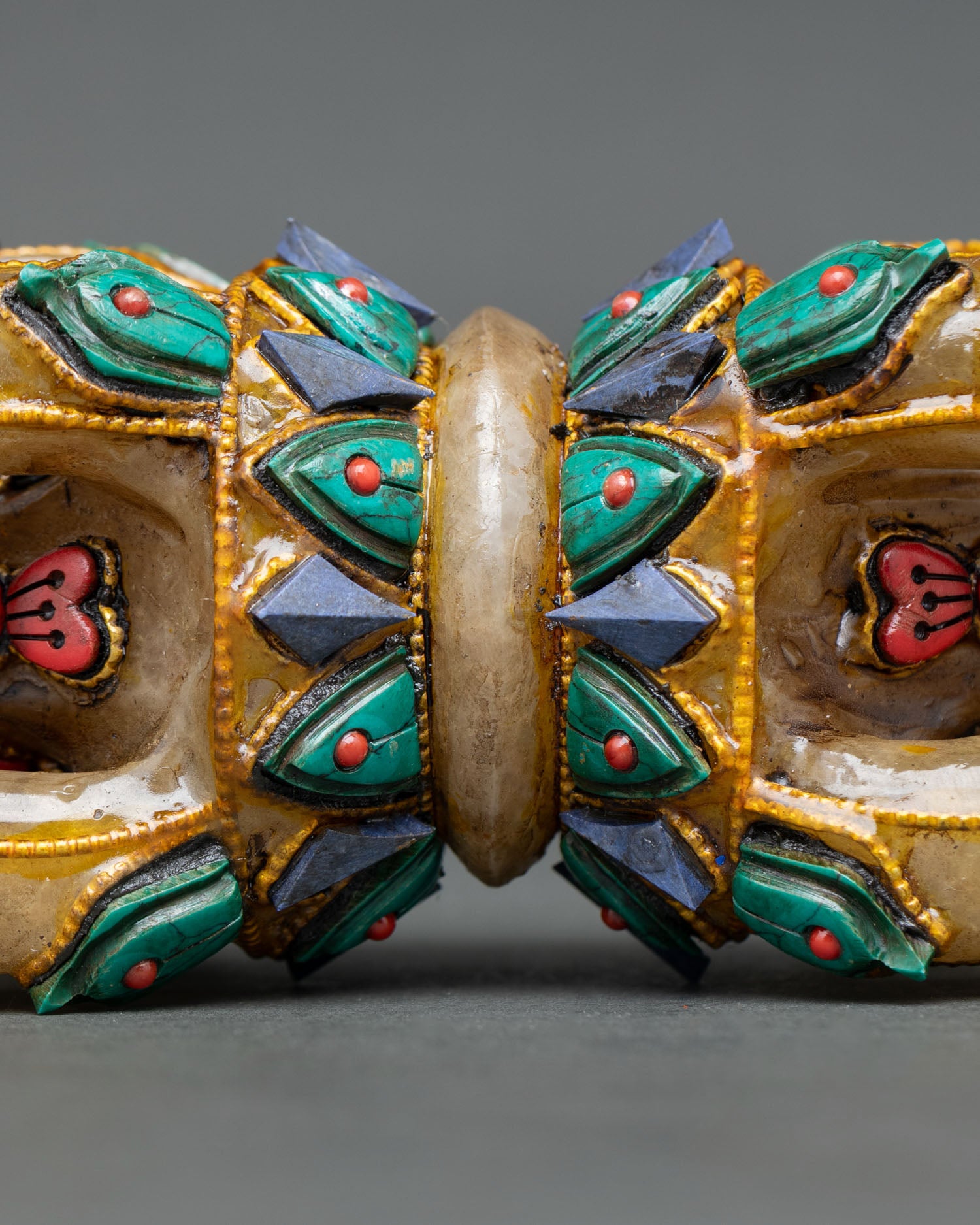 nepalese crystal vajra with turquoise coral and gold filigree craftsmanship