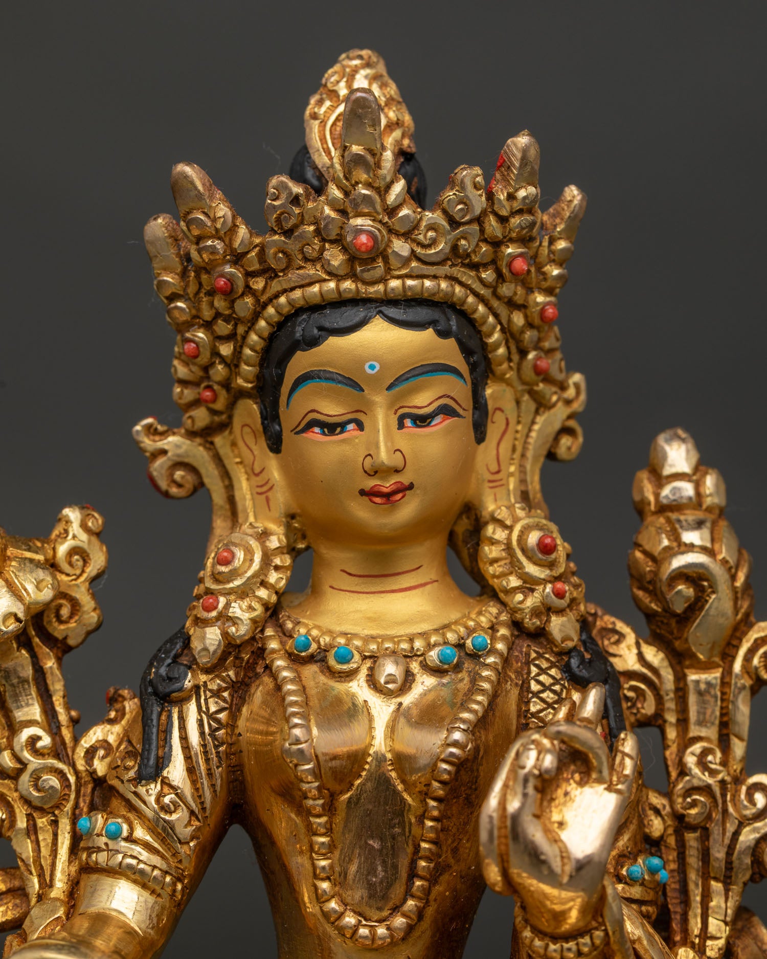 Nepalese Green Tara statue featuring Abhaya Mudra for protection and fearlessness