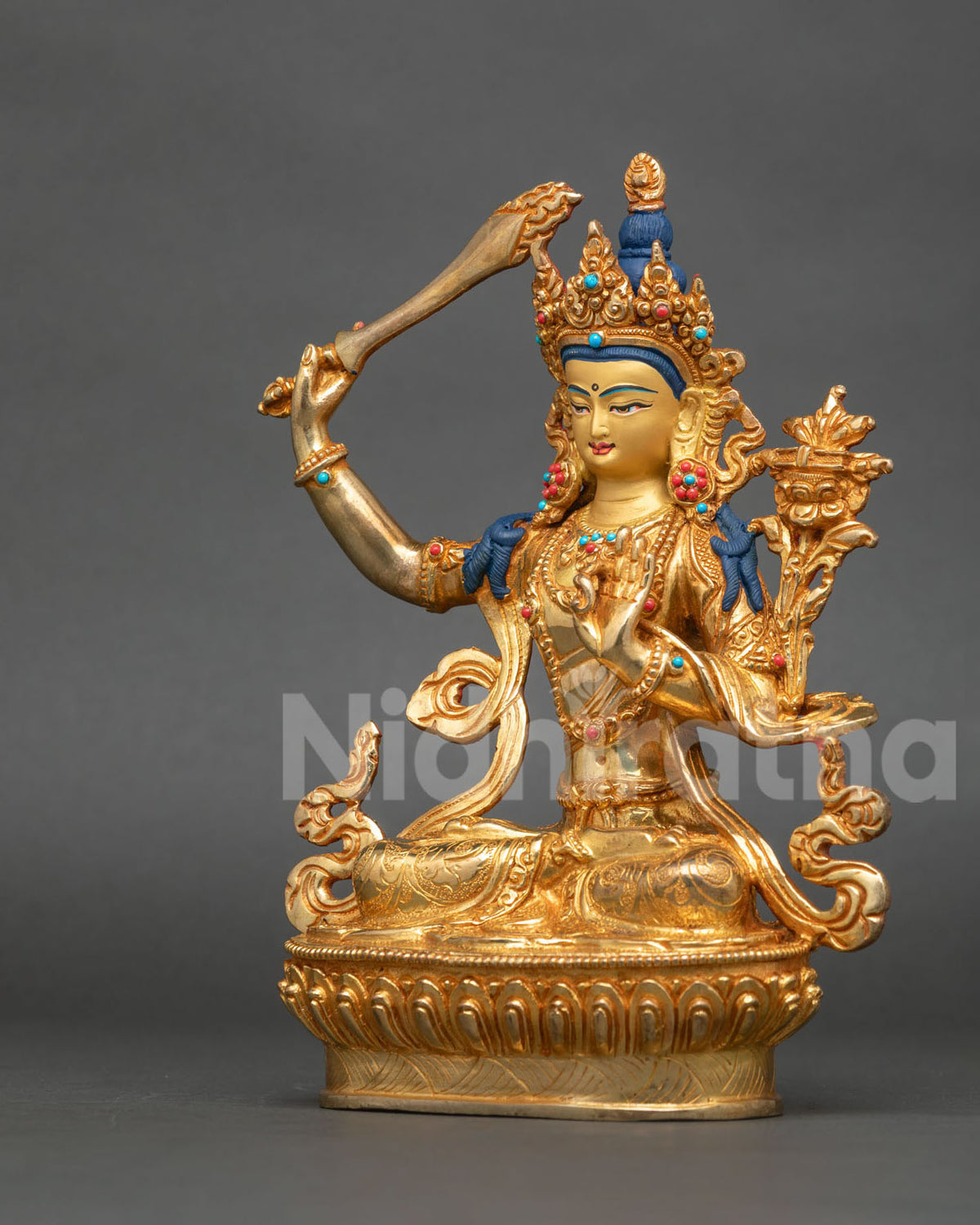 Nepalese Manjushri Statue seated on lotus pedestal with five jeweled crown