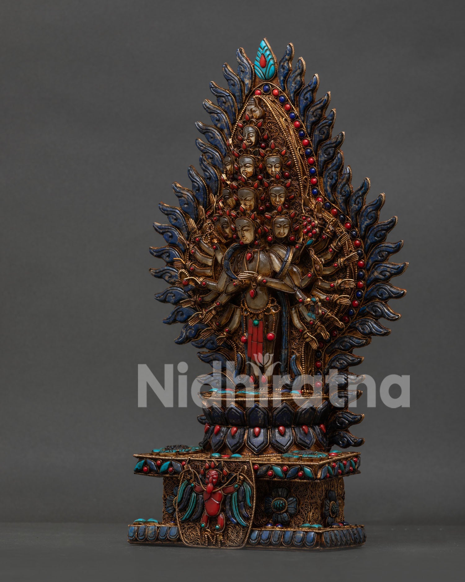 Nepalese Thousand Armed Chenrezig statue with copper filigree and radiant halo design