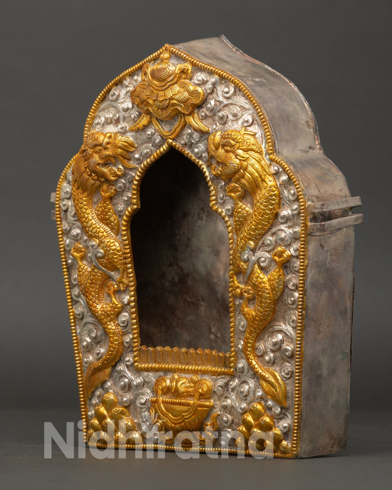 Newari handcrafted Ghau Box featuring intricate Himalayan Buddhist metalwork