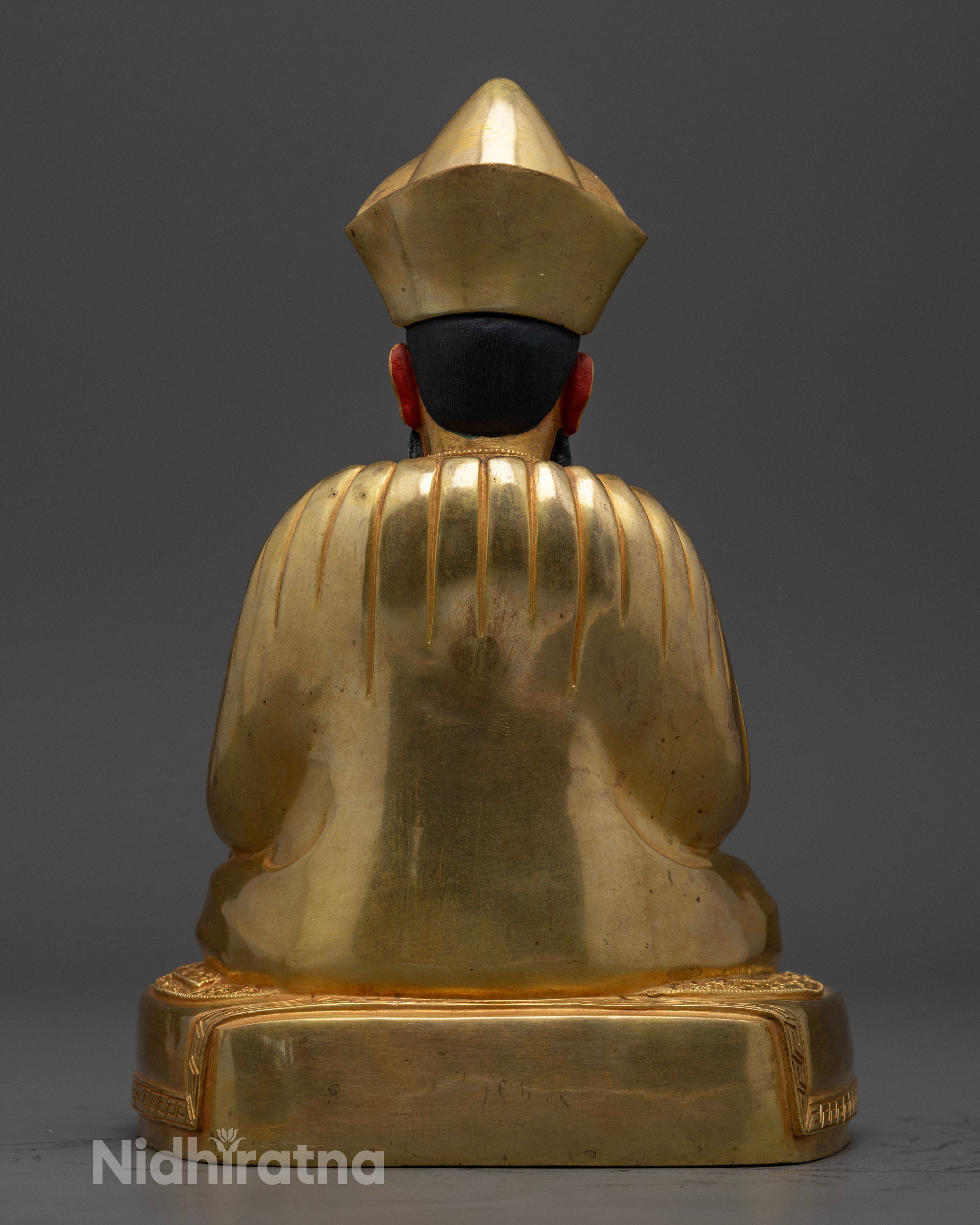 ngawang namgyal statue left side view, detailed copper and gold craftsmanship, tibetan guru sculpture