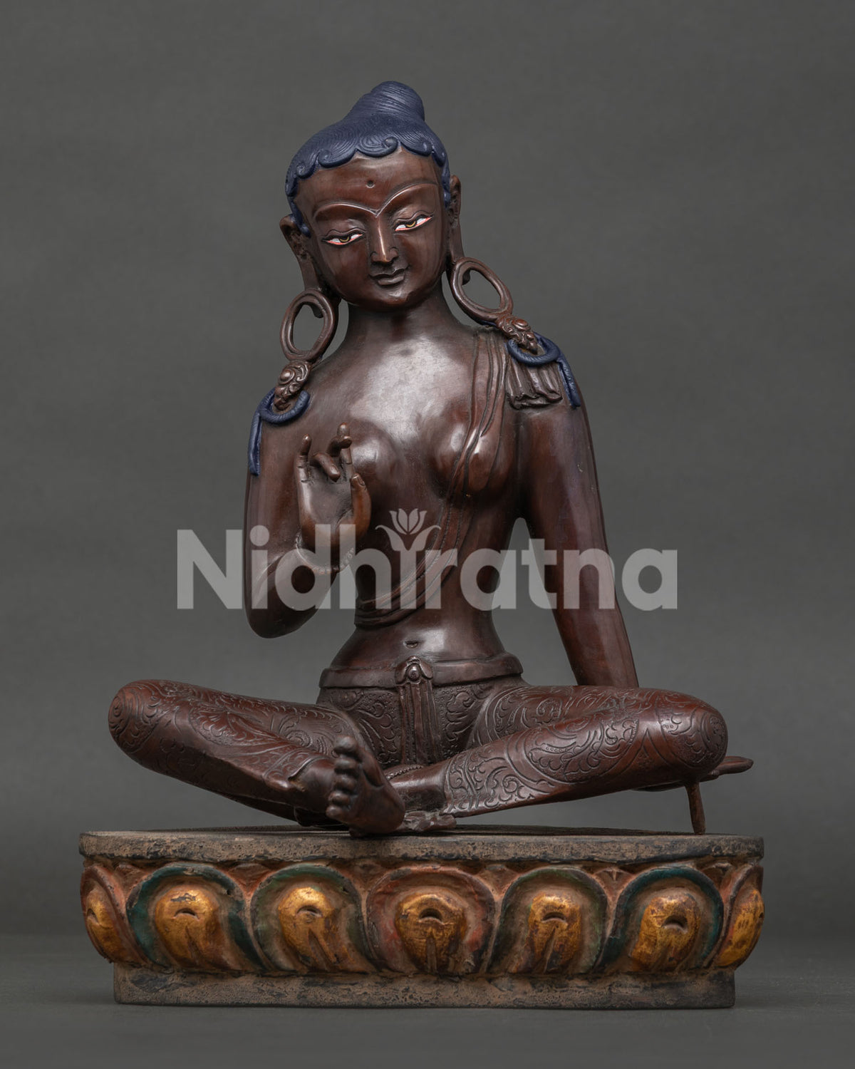 Oxidized Copper Green Tara Statue front view, handcrafted in Nepal, seated on lotus in abhaya mudra