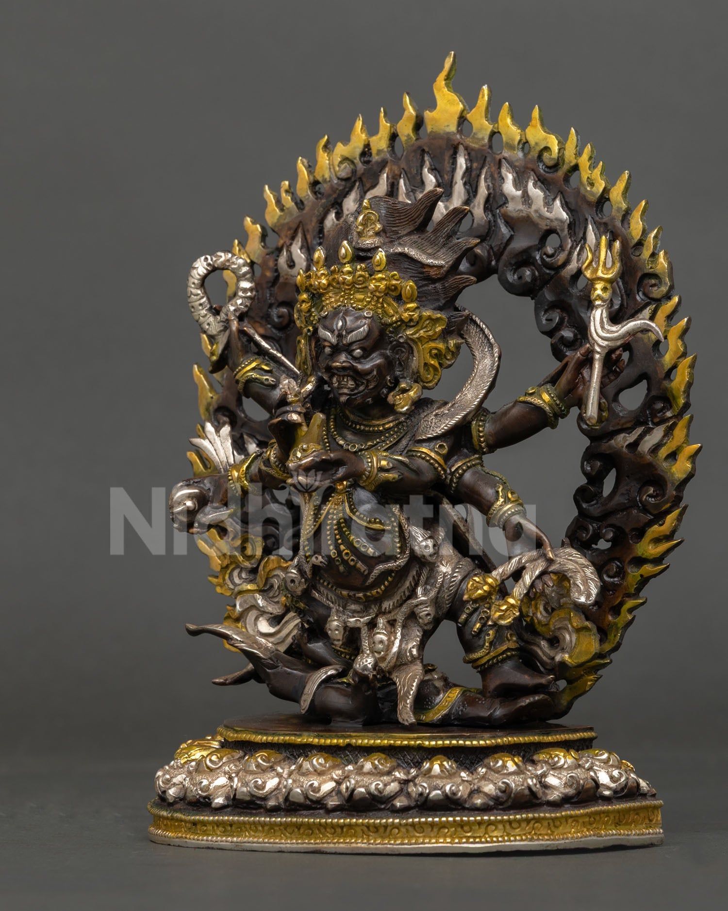Oxidized six-armed Mahakala statue left side view, copper Buddhist deity figurine Nepal