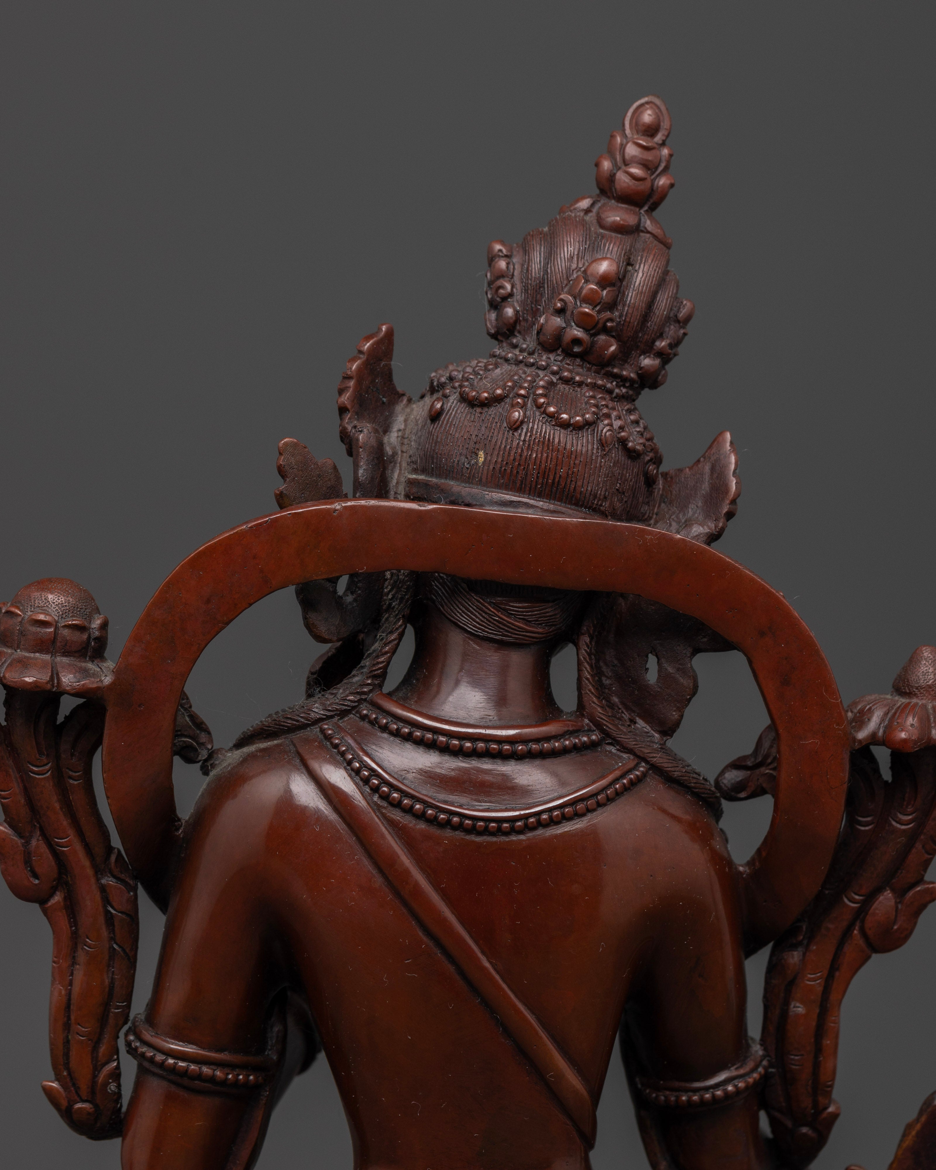 back view of hair of oxidized white tara statue