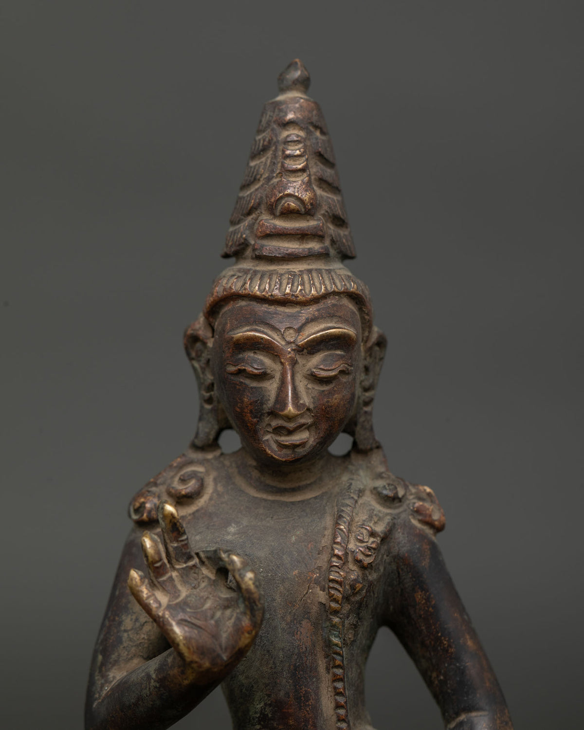 Padmapani Statue close up Abhaya Mudra silk garment lotus Bodhisattva.