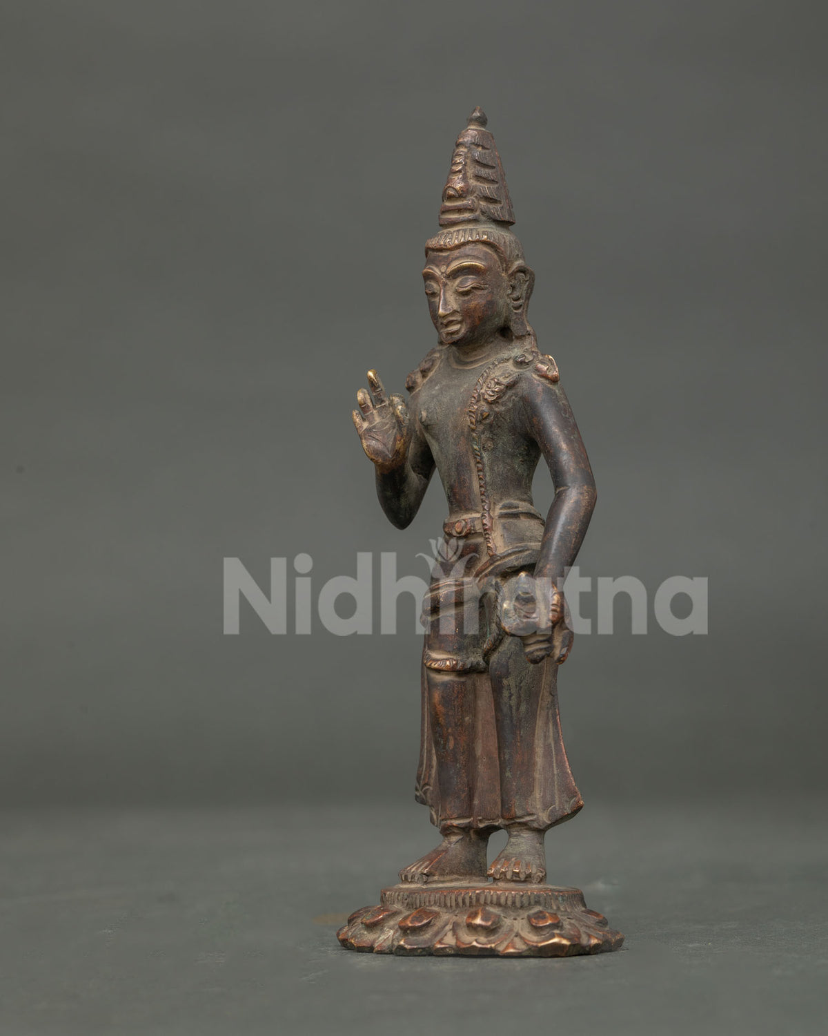 Padmapani Statue left side view Avalokiteshvara compassion Bodhisattva lotus.