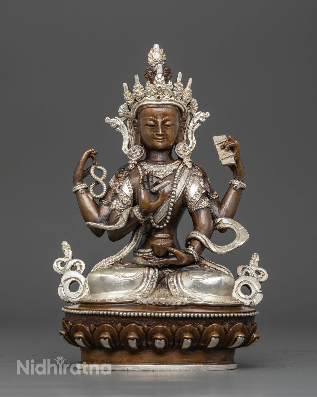 Prajnaparamita statue handcrafted from copper with oxidized and silver plated finish