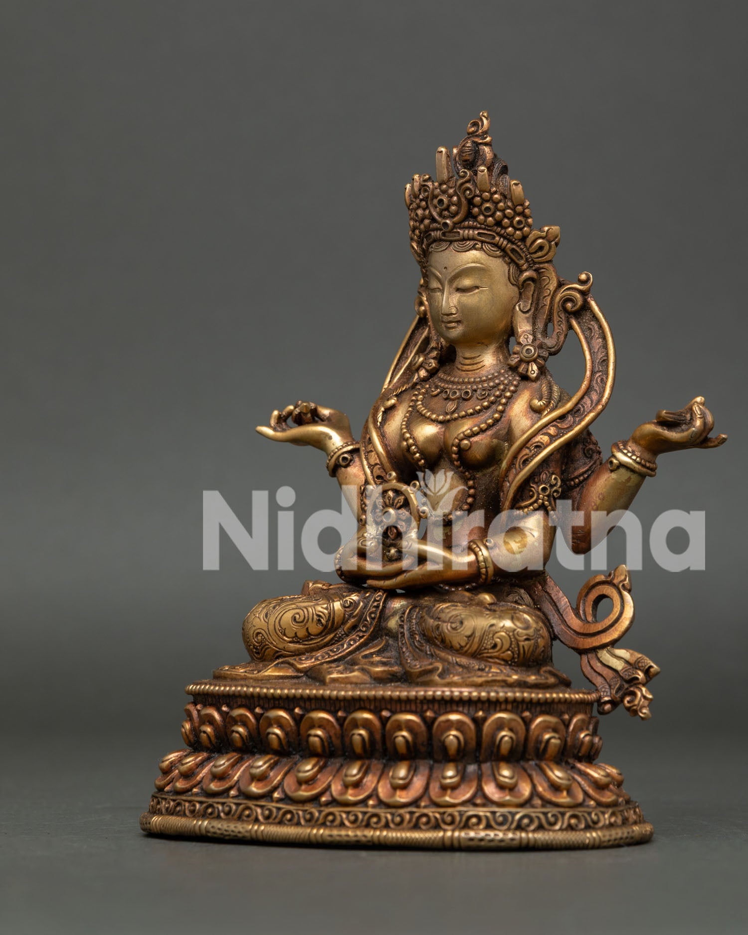 Prajnaparamita statue in Dharmachakra Mudra with gold fire gilded finish.