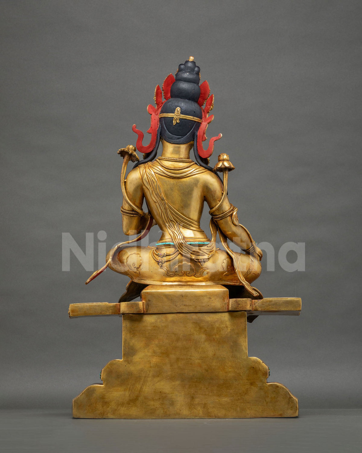Rear view of Green Tara meditation statue with gold gilded copper body and hand-painted hair