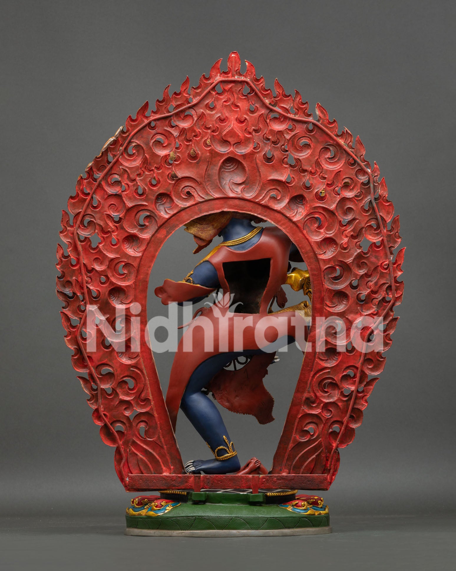 Rear view of handmade Troma Nagmo Statue with detailed flaming halo and copper craftsmanship.