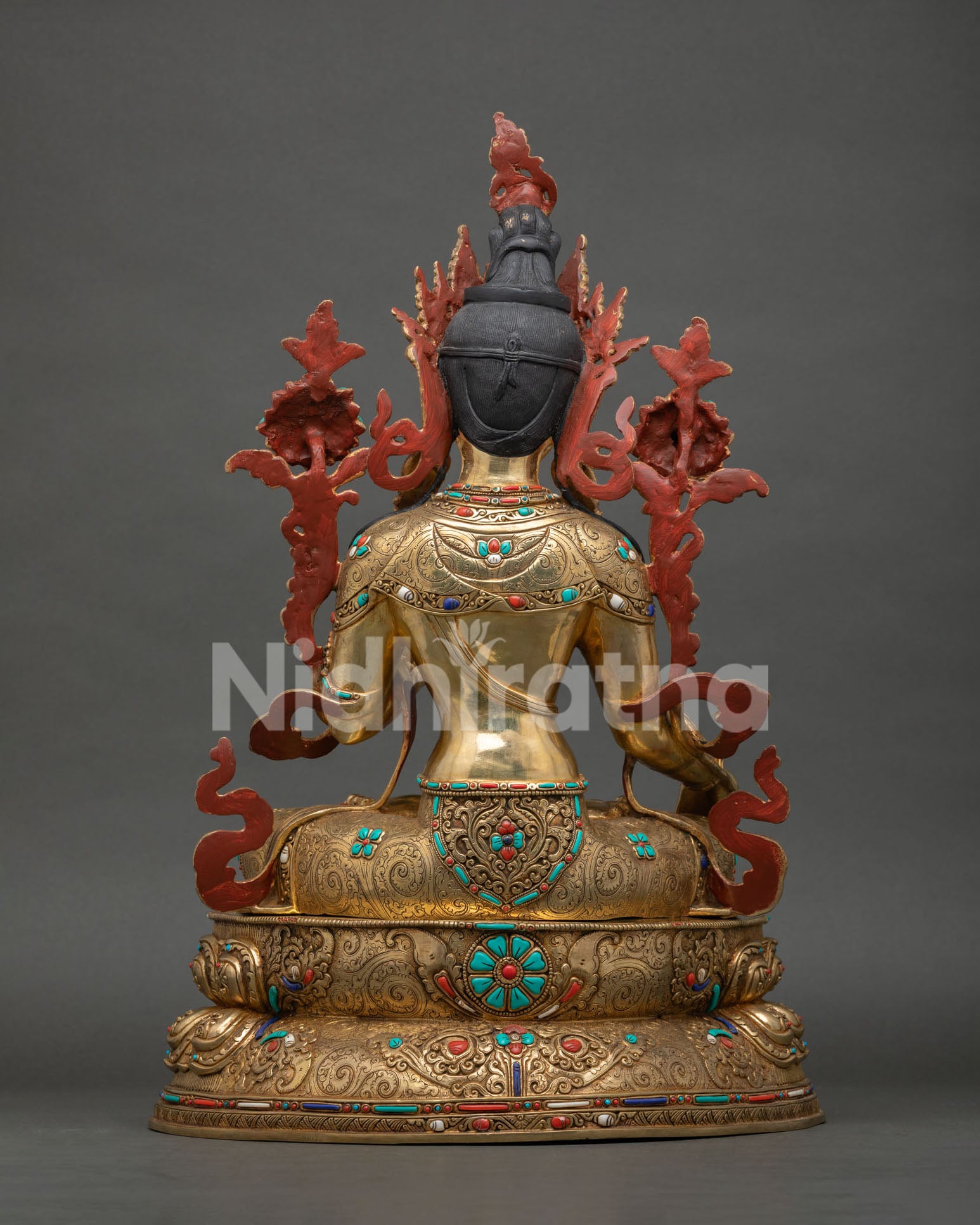 Rear view of White Tara Statue displaying detailed back ornaments and lotus pedestal