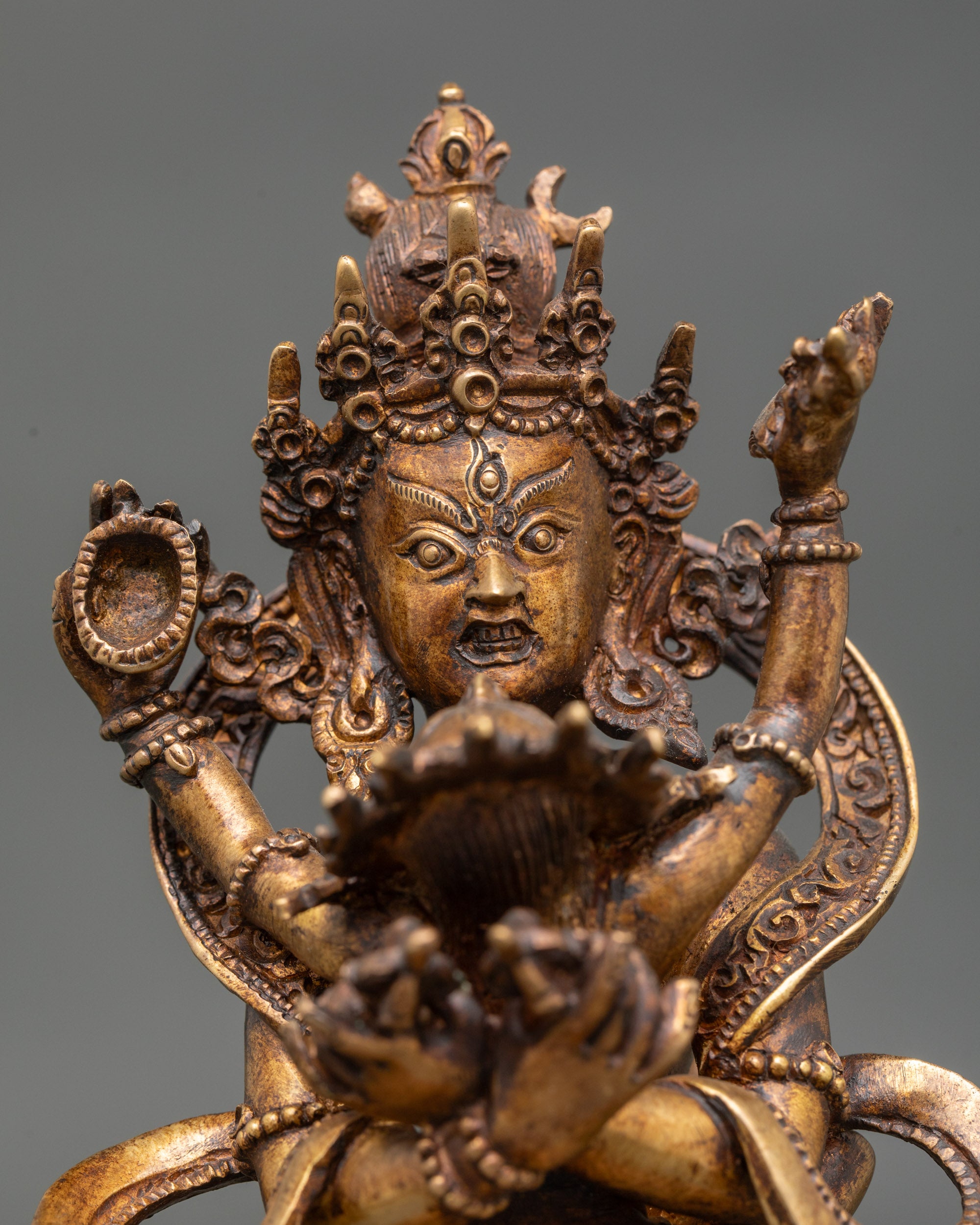 Regular close-up of Chakrasamvara statue showing lotus seat and intricate details