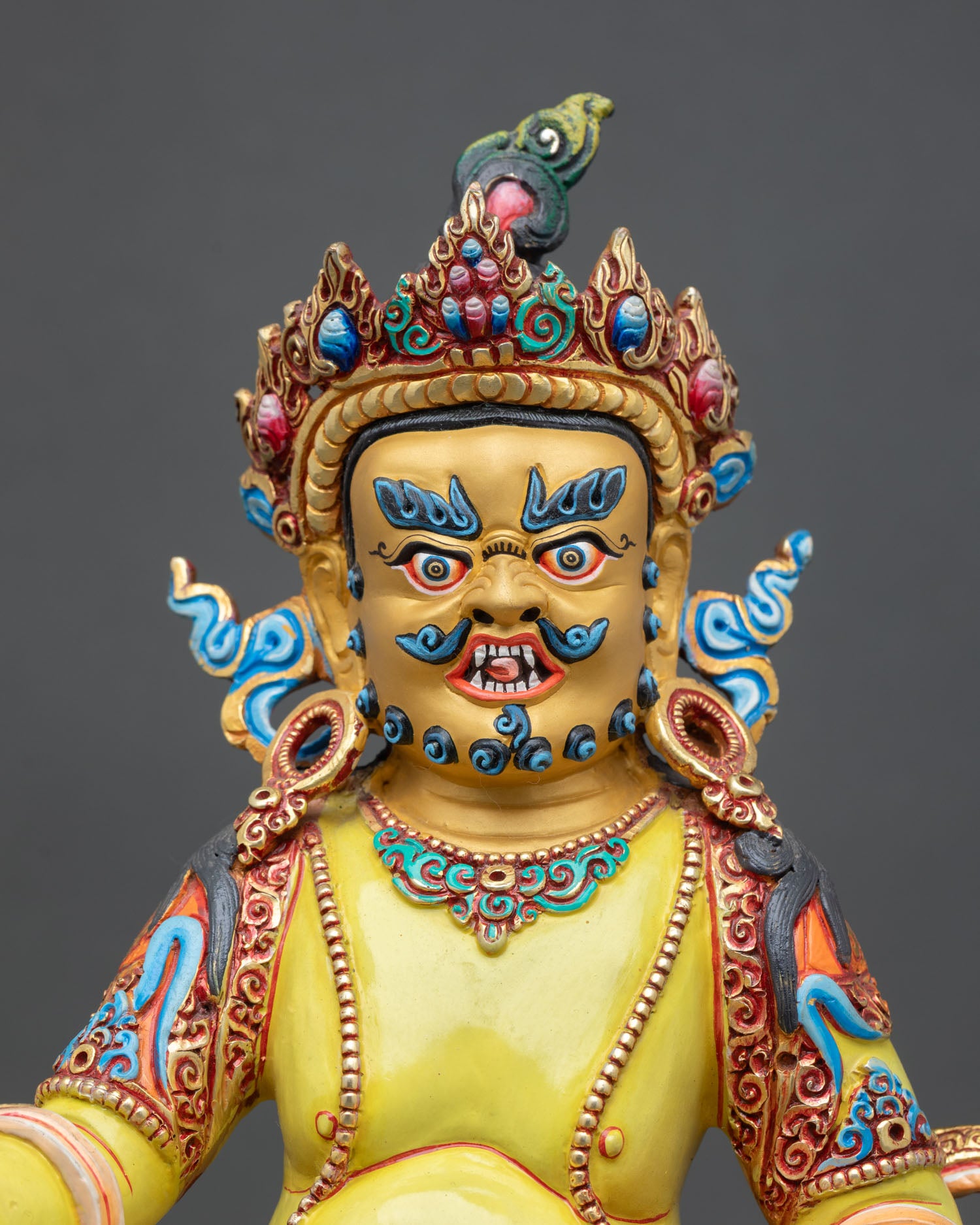 regular close up dzambhala statue vibrant acrylic color details citron fruit mongoose