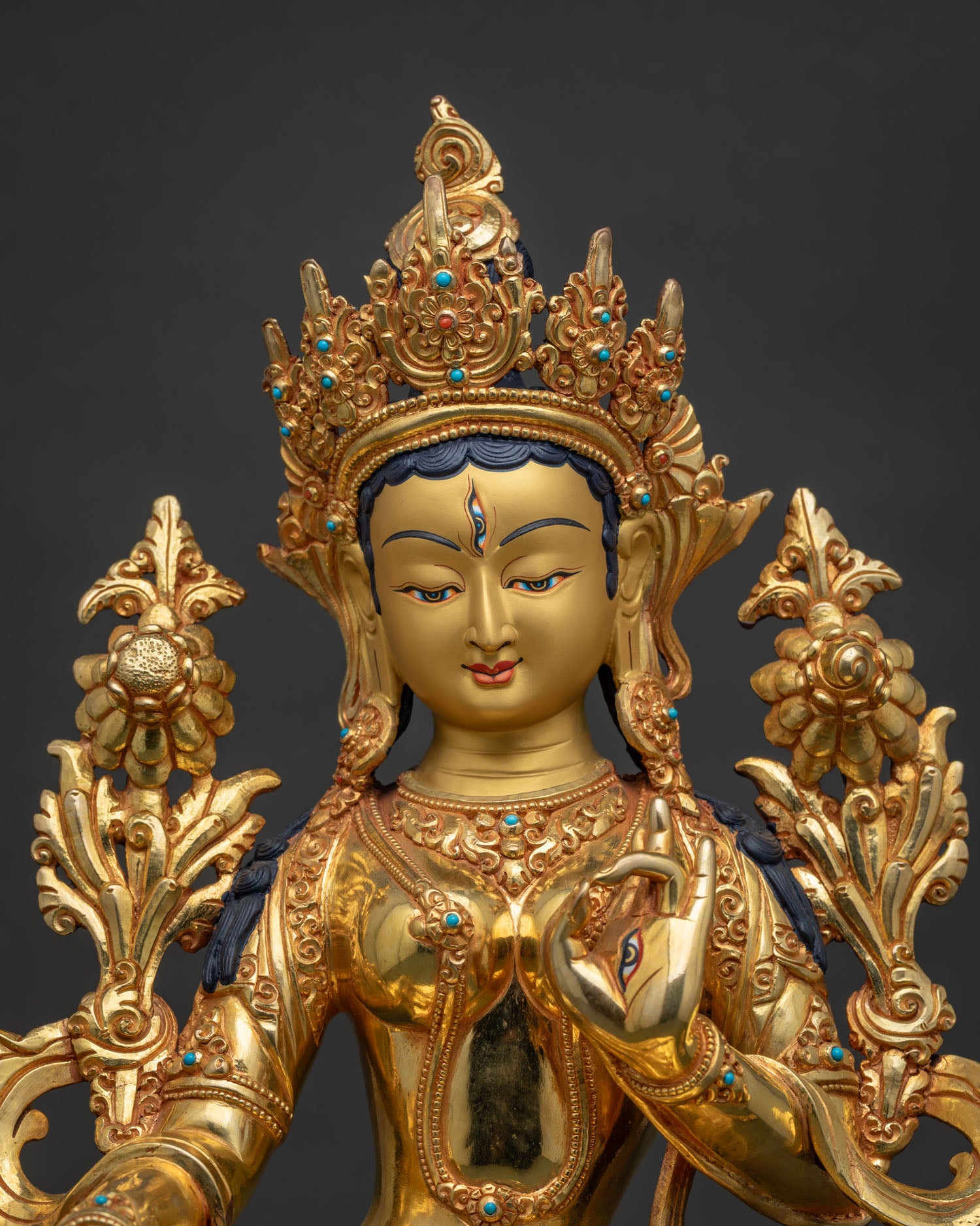 Regular close up of White Tara Statue showing seven eyes and intricate Newari craftsmanship