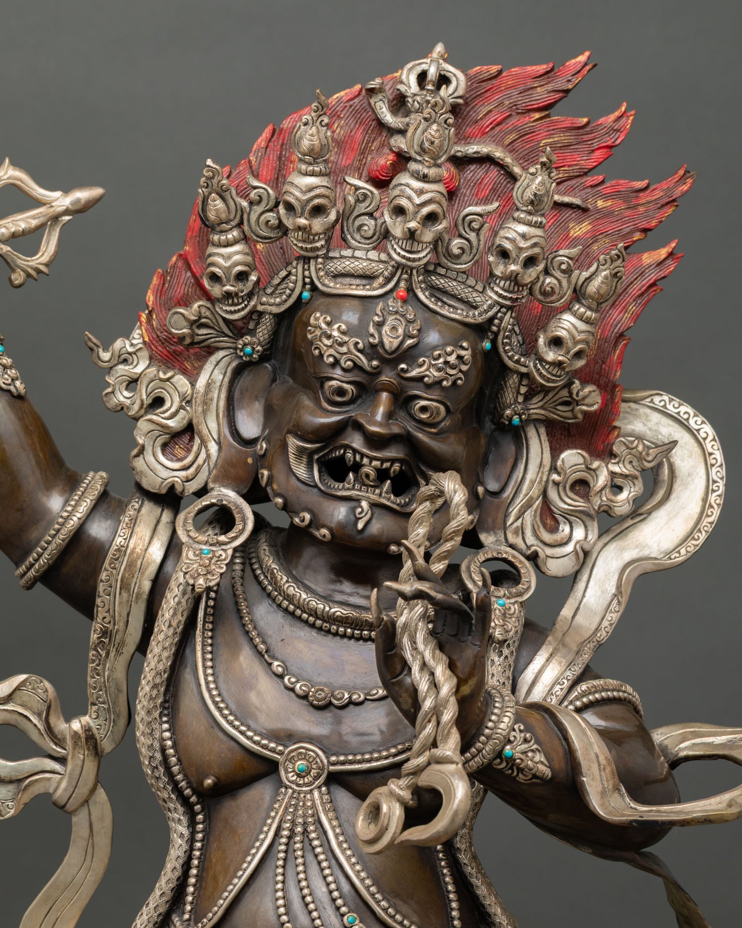 Vajrapani statue detailed copper craftsmanship with silver plated ornaments and stone inlays