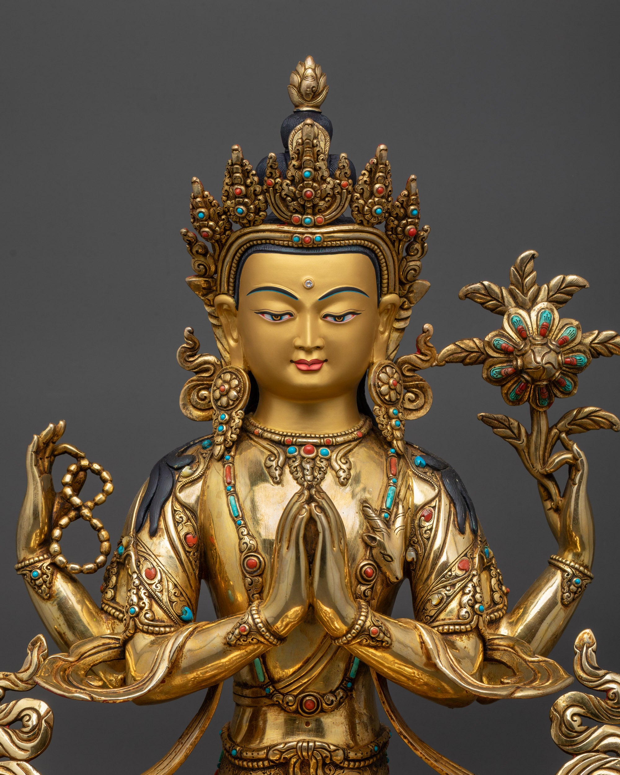 regular close up Four-Armed Chenrezig statue with jeweled crown, armlets, and jewelry